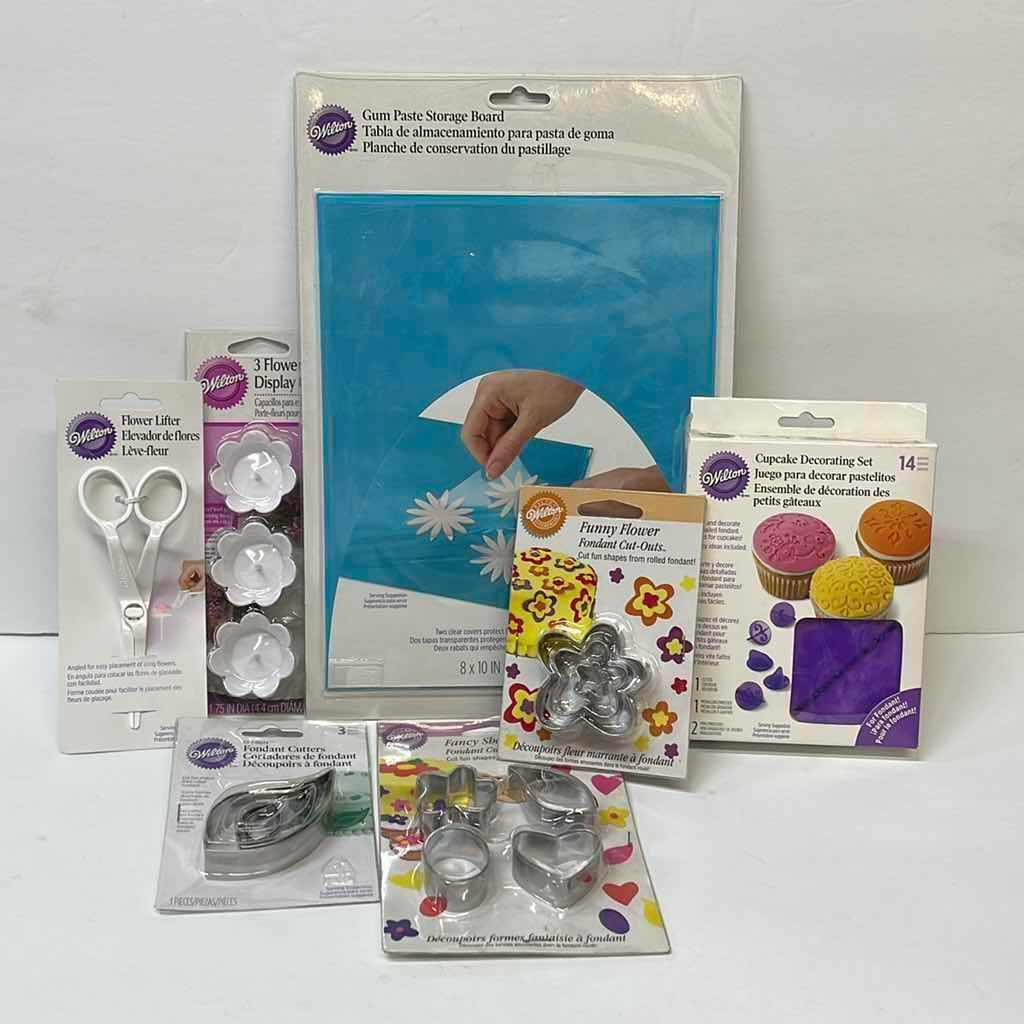 Photo 1 of NIB WILTON FONDANT CUTTERS , GUM PASTE STORAGE BOARD AND MORE- TOTAL RETAIL PRICE $45.00