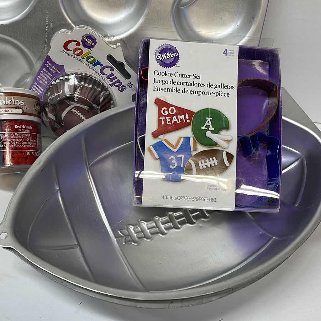 Photo 2 of NEW WILTON FOOTBALL PARTY CAKE PANS , CUPCAKE LINNERS , TOPPERS AND MORE - RETAIL PRICE $50.00