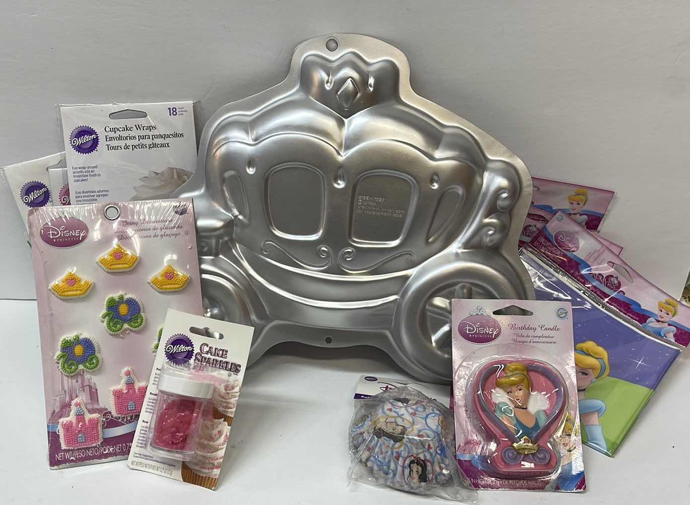 Photo 1 of NOS / NWT WILTON DISNEY PARTY SUPPLIES W/ VTG CARRIAGE CAKE MOLD- TOTAL RETAIL PRICE $51.00