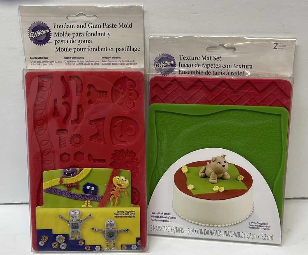 Photo 1 of NEW WILTON FONDANT AND GUM PASTE MOLD “ROBOTS & MONSTERS” & TEXTURE MAT SET - RETAIL PRICE $21.00