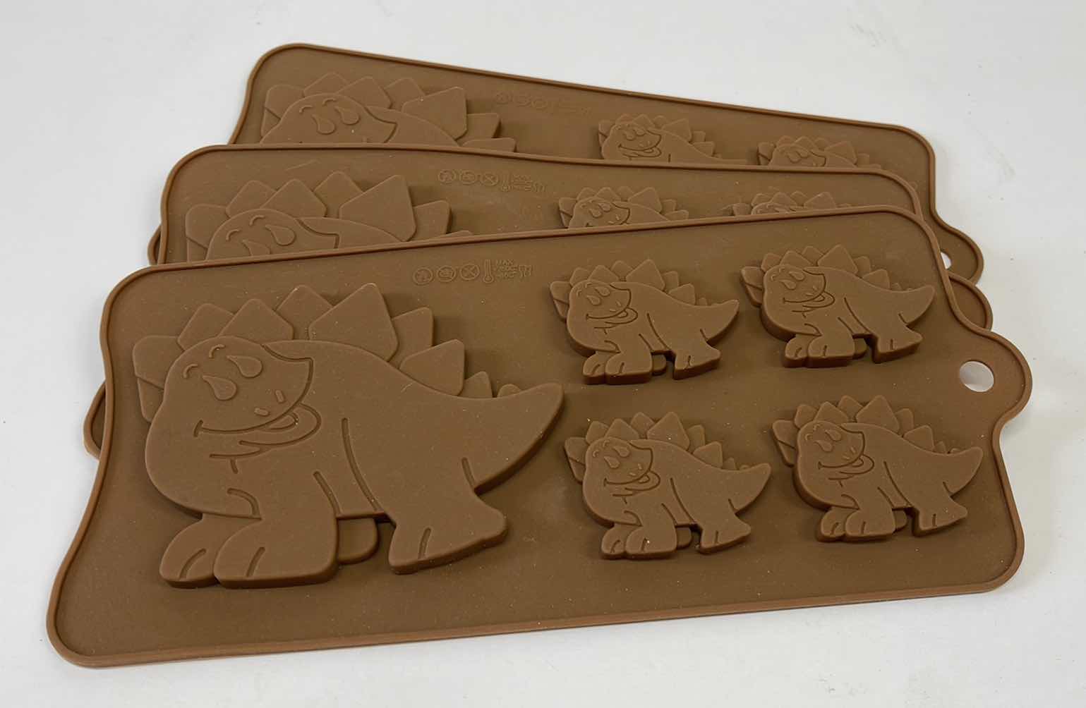 Photo 1 of NEW SILICONE DINOSAUR CANDY AND OTHER CRAFTS MOLDS -TOTAL RETAIL PRICE $18.00