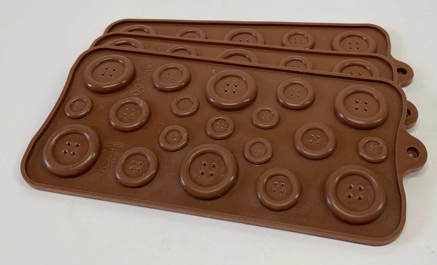 Photo 1 of NEW SILICONE BUTTON CANDY AND OTHER CRAFTS MOLDS -TOTAL RETAIL PRICE $22.00