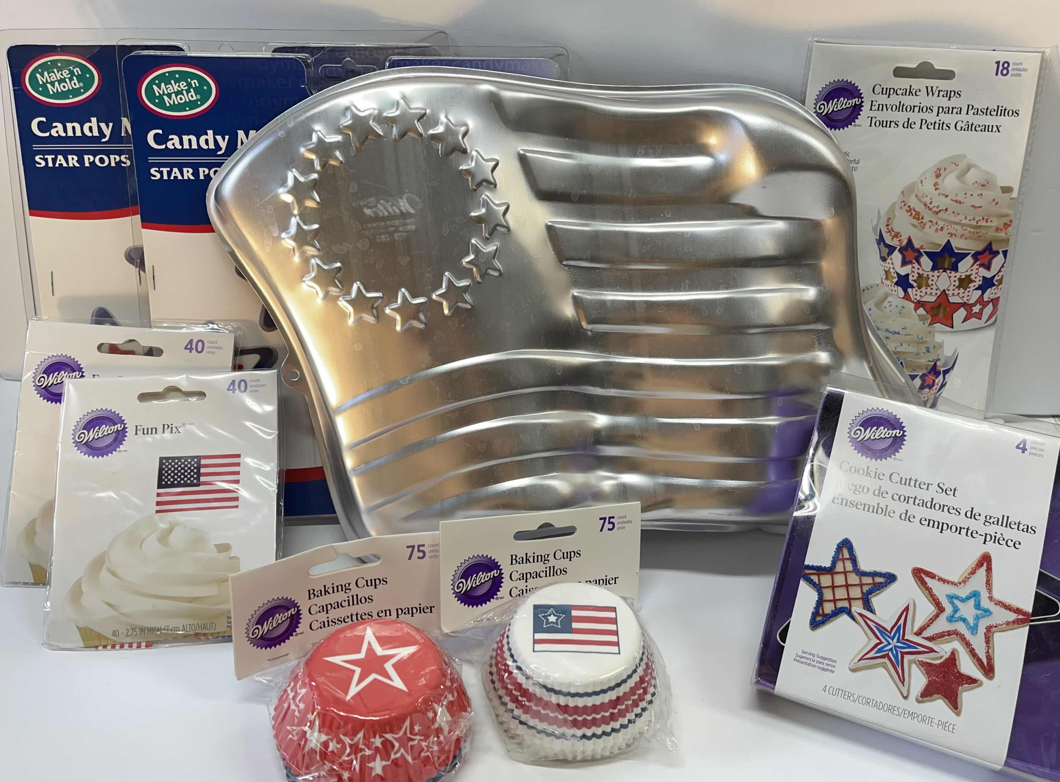 Photo 1 of NEW WILTON AMERICAN FLAG CAKE PAN, CUPCAKE HOLDERS , PICKS, CANDY MOLDS AND MORE- TOTAL RETAIL PRICE $45.00