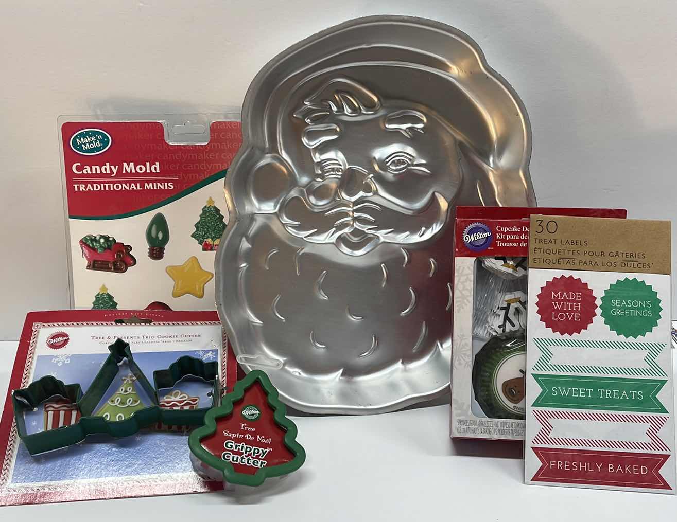 Photo 1 of NOS VINTAGE WILTON SANTA CAKE MOLD , COOKIE CUTTERS & MORE - TOTAL RETAIL PRICE $32.99