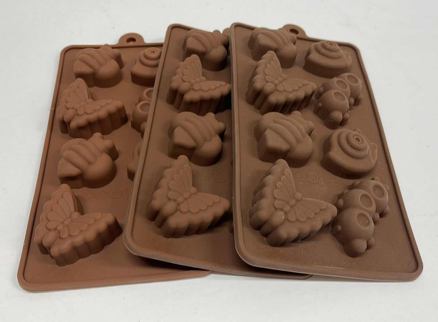 Photo 1 of NEW 3 SILICONE SPRING TIME TIME CHOCOLATE / CANDY / ICE MOLDS - TOTAL RETAIL PRICE $22.00