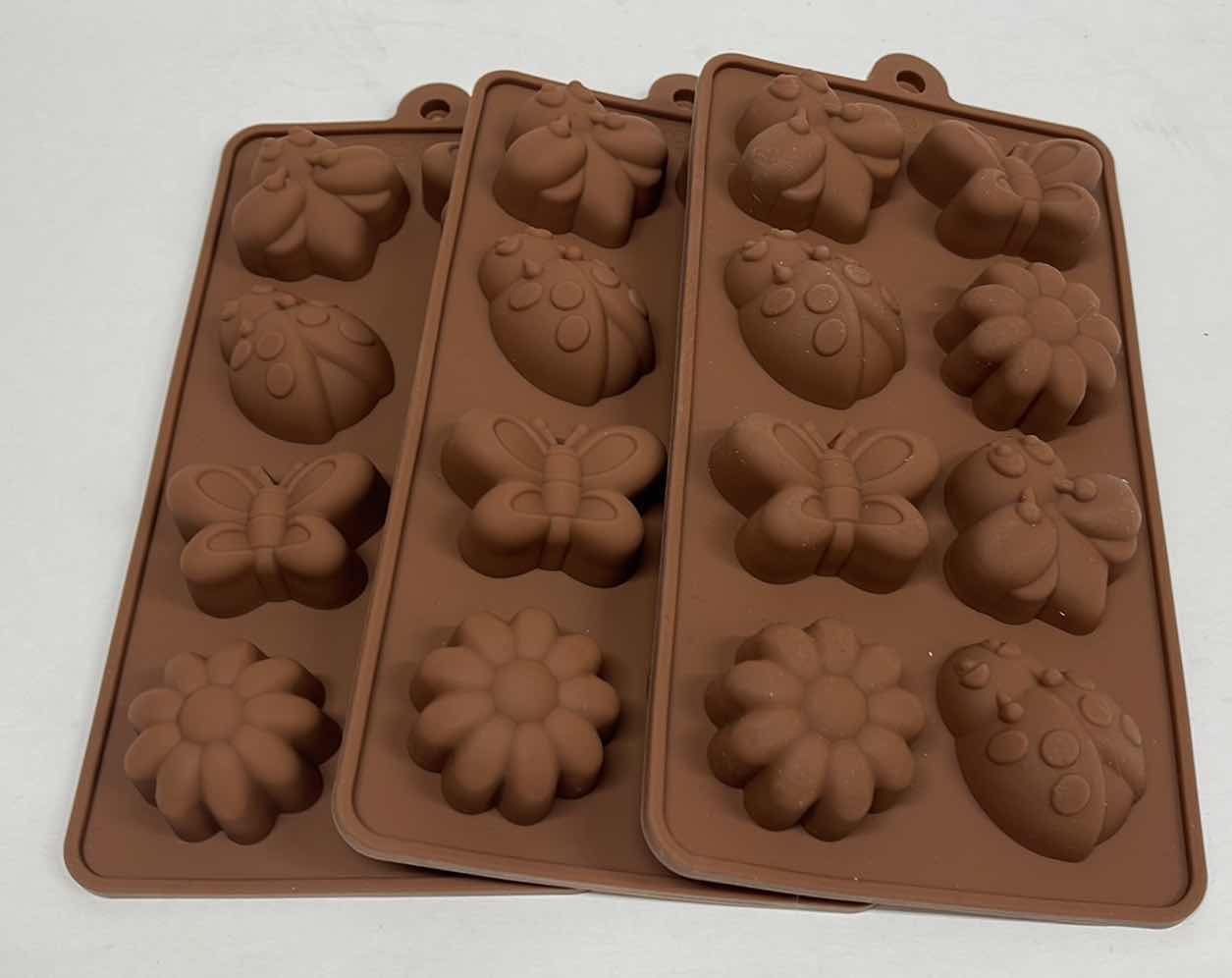 Photo 1 of NEW 3 SILICONE SPRING TIME CHOCOLATE / CANDY / ICE MOLDS - TOTAL RETAIL PRICE $22.00