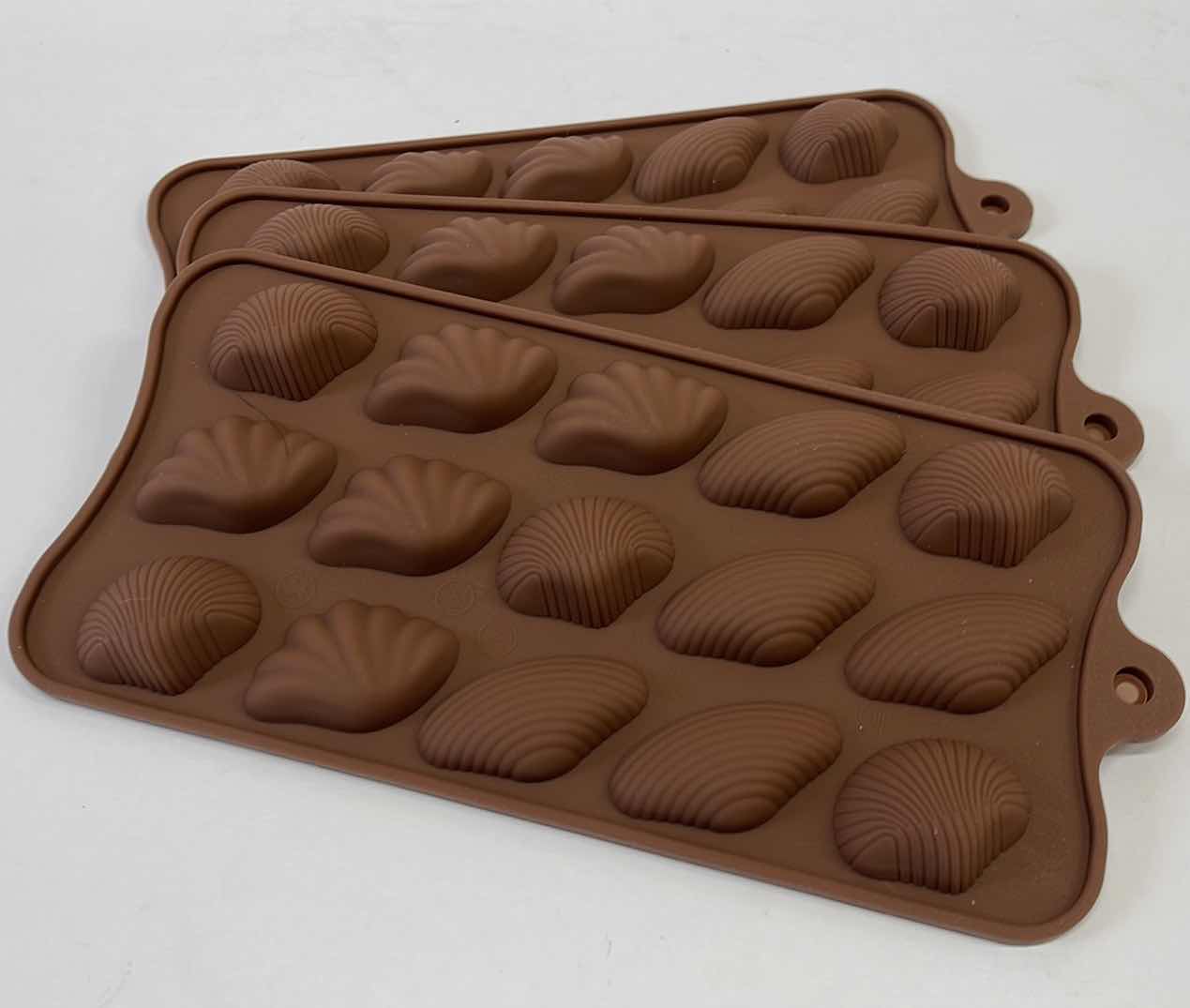 Photo 1 of NEW SILICONE SHELL CHOCOLATE / CANDY / ICE MOLDS - TOTAL RETAIL PRICE $22.00