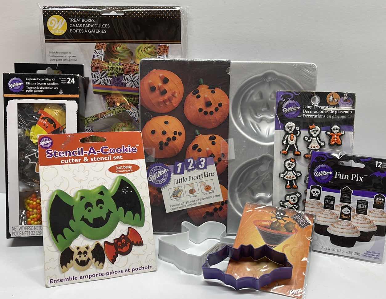 Photo 1 of NEW WILTON LITTLE PUMPKINS TRAYS , TREAT BOXES , CUPCAKE HOLDERS, COOKIE CUTTERS AND MORE - TOTAL RETAIL PRICE $45.00