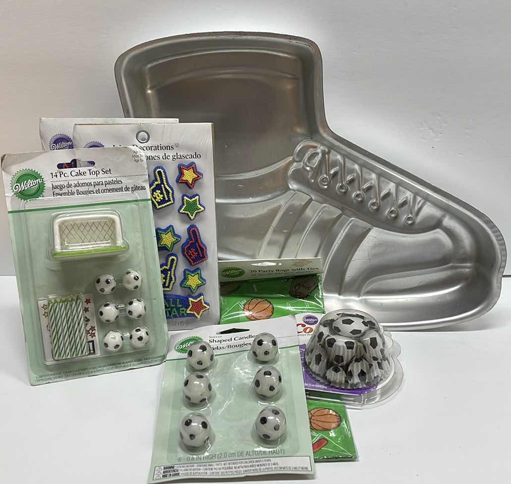 Photo 1 of NOS WILTON SPORTS CAKE PAN , SOCCER CUPCAKE LINERS , CANDLES & MORE - TOTAL RETAIL PRICE $34.00