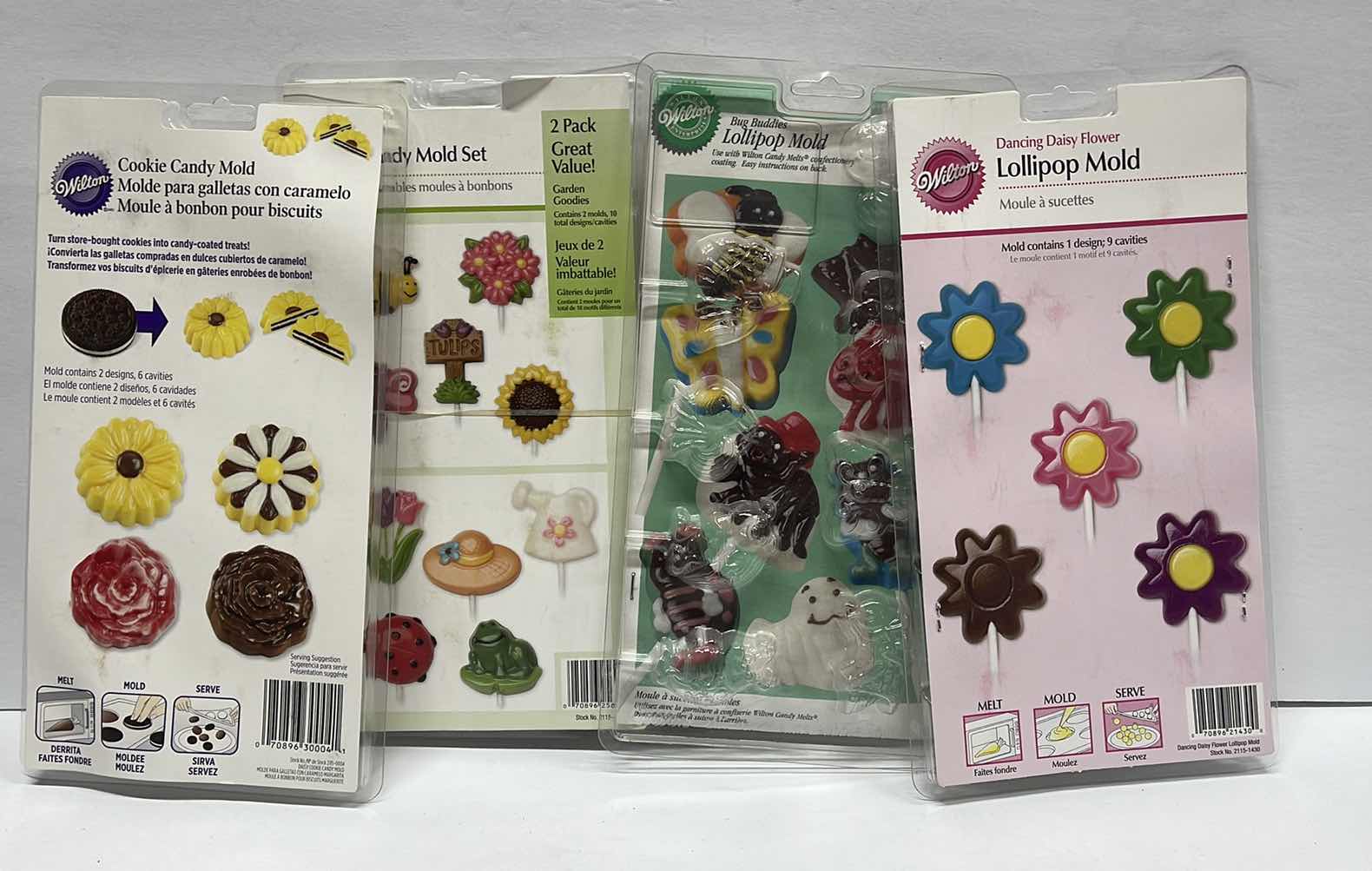 Photo 1 of NEW WILTON SPRING / SUMMER LOLLIPOP / COOKIE / CANDY PICKS AND PRETZEL MOLDS - TOTAL RETAIL PRICE $ 42.00