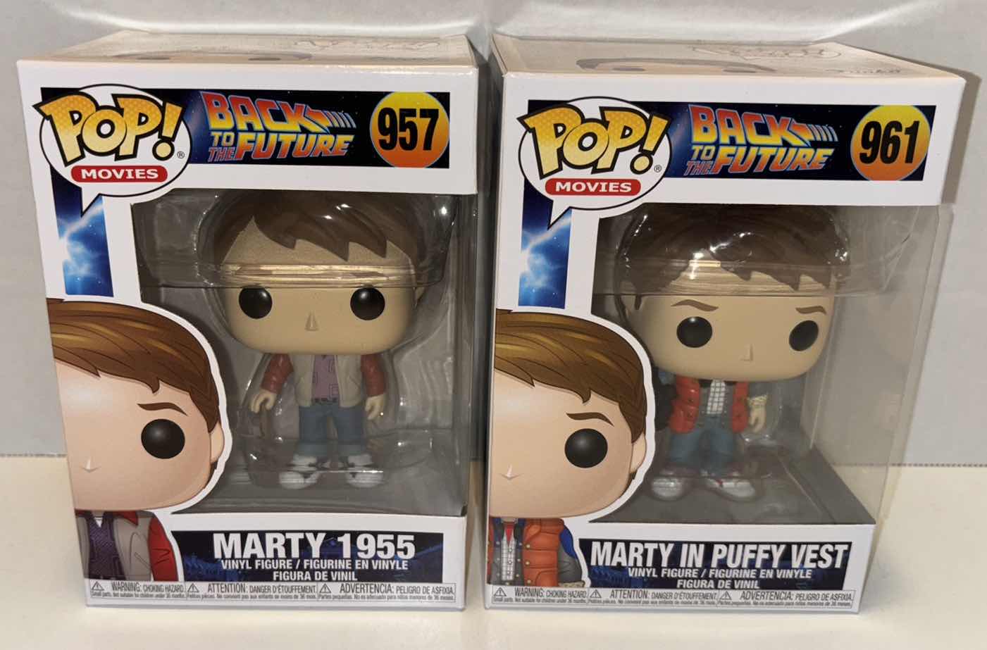 Photo 1 of NEW FUNKO POP! MOVIES VINYL FIGURE, 2-PACK BACK TO THE FUTURE #957 MARTY 1955 & #961 MARTY IN PUFFY VEST