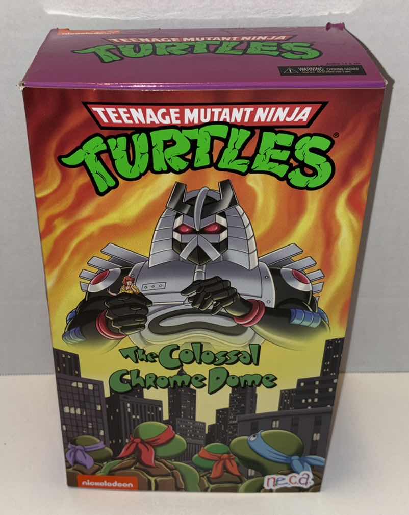 Photo 1 of NEW NECA TEENAGE MUTANT NINJA TURTLES ULTIMATE 7” ACTION FIGURE & ACCESSORIES, “THE COLOSSAL CHROME DOME”