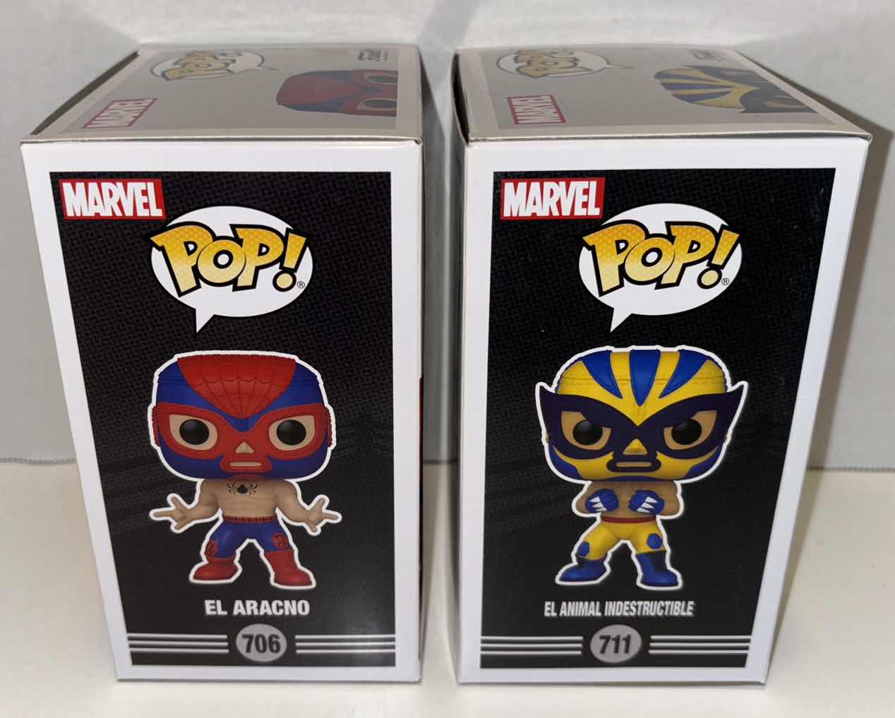 Photo 1 of NEW FUNKO POP! MARVEL LUCHA LIBRE EDITION EXCLUSIVE MARVEL COLLECTOR CORPS BOBBLE-HEAD, #706 EL ARACNO (SPIDER-MAN) & #711 EL ANIMAL INDESTRUCTIBLE (WOLVERINE)