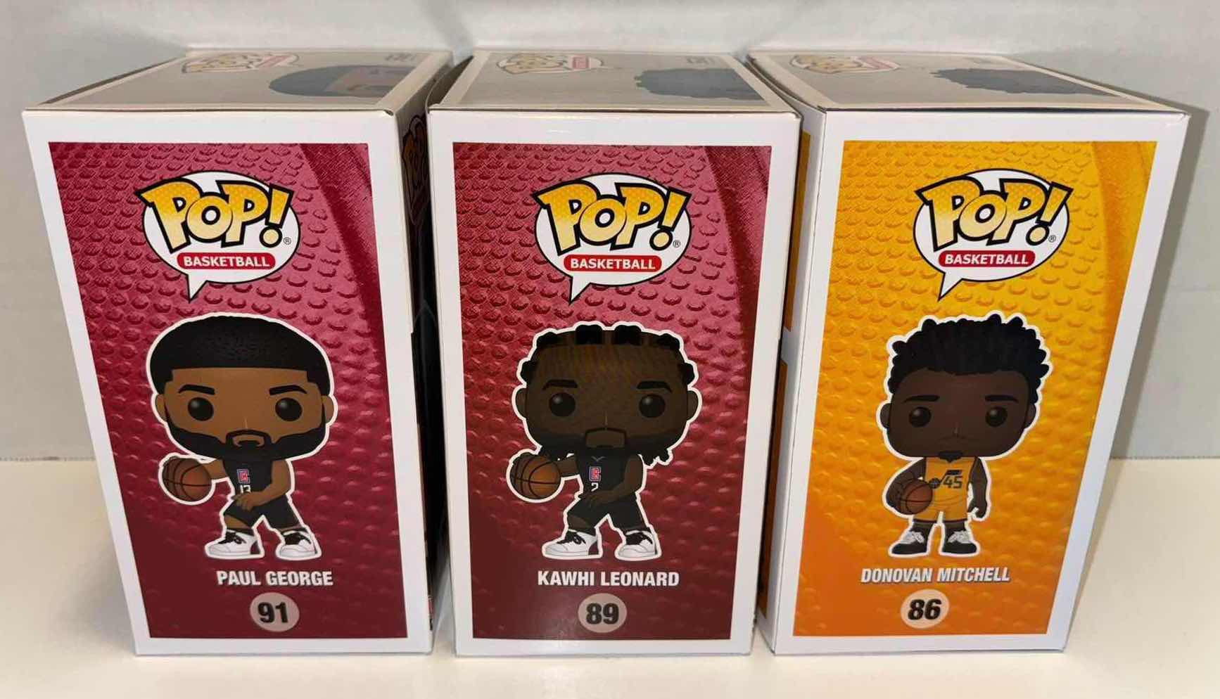 Photo 2 of NEW FUNKO POP! BASKETBALL VINYL FIGURE MIXED 6-PACK, CLIPPERS #91 PAUL GEORGE (3), CLIPPERS #89 KAWHI LEONARD (2), JAZZ #86 DONOVAN MITCHELL (1)