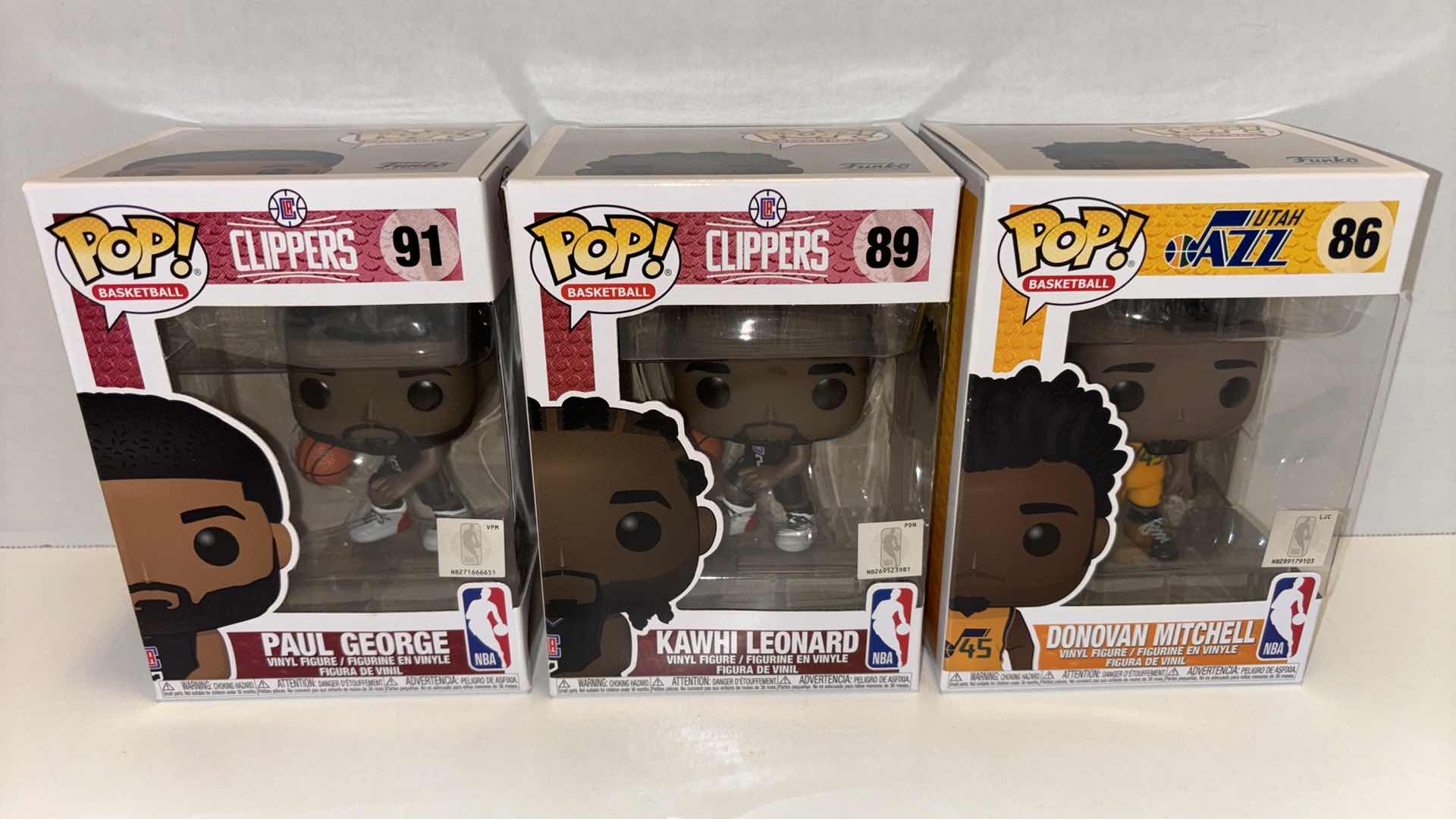 Photo 1 of NEW FUNKO POP! BASKETBALL VINYL FIGURE MIXED 6-PACK, CLIPPERS #91 PAUL GEORGE (3), CLIPPERS #89 KAWHI LEONARD (2), JAZZ #86 DONOVAN MITCHELL (1)