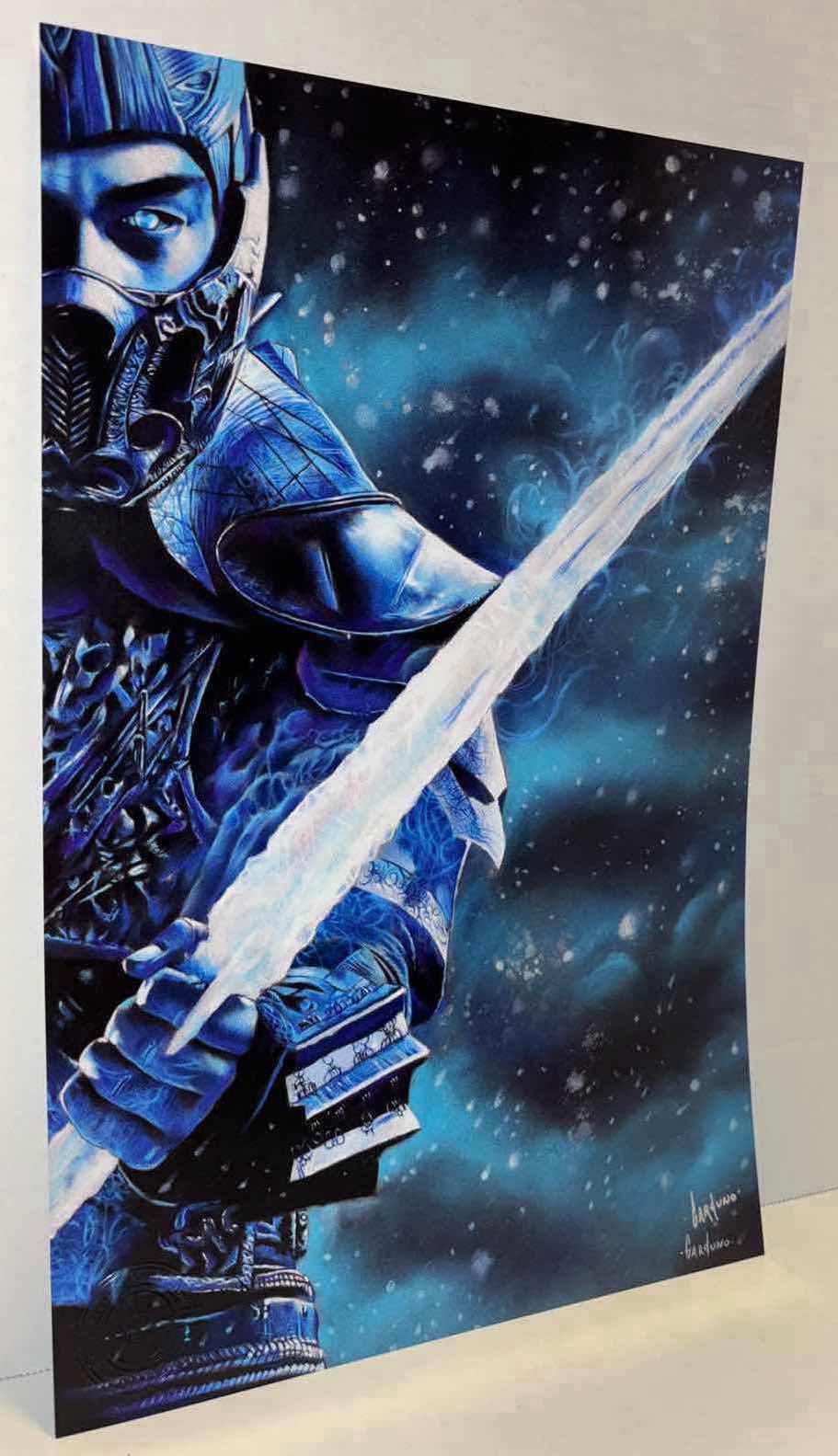 Photo 1 of VICTOR GARDUNO “ICE SWORD” 11” X 17” INFINITY GLOSS UNFRAMED PRINT W EMBOSSED SEAL, DIGITAL SIGNATURE & OFFICIAL SIGNATURE W COA INCLUDED, STORED IN A RIGID PRINT PROTECTOR SLEEVE