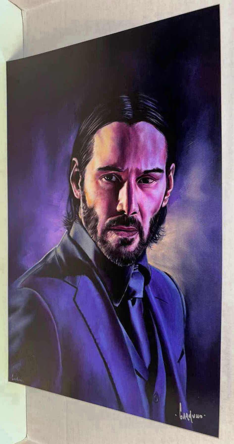 Photo 1 of VICTOR GARDUNO JOHN WICK 11” X 17” INFINITY GLOSS UNFRAMED PRINT W EMBOSSED SEAL, DIGITAL SIGNATURE & OFFICIAL SIGNATURE W COA INCLUDED, STORED IN A RIGID PRINT PROTECTOR SLEEVE