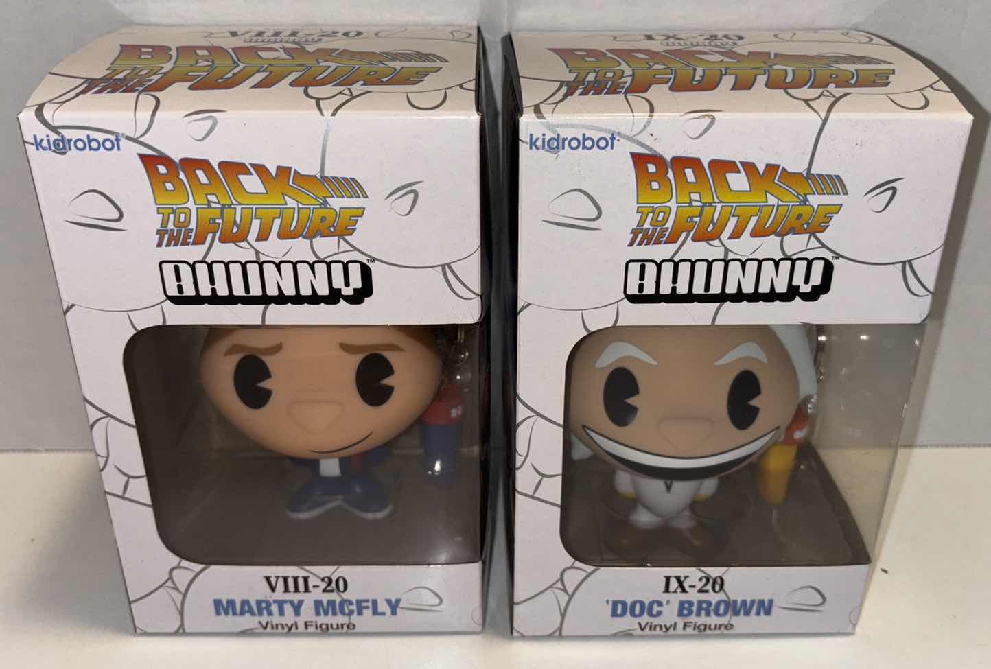 Photo 1 of NEW KIDROBOT BACK TO THE FUTURE 2-PACK BHUNNY 4” VINYL FIGURE, MARTY MCFLY & DOC BROWN W BHUNNY PAW KEYCHAIN