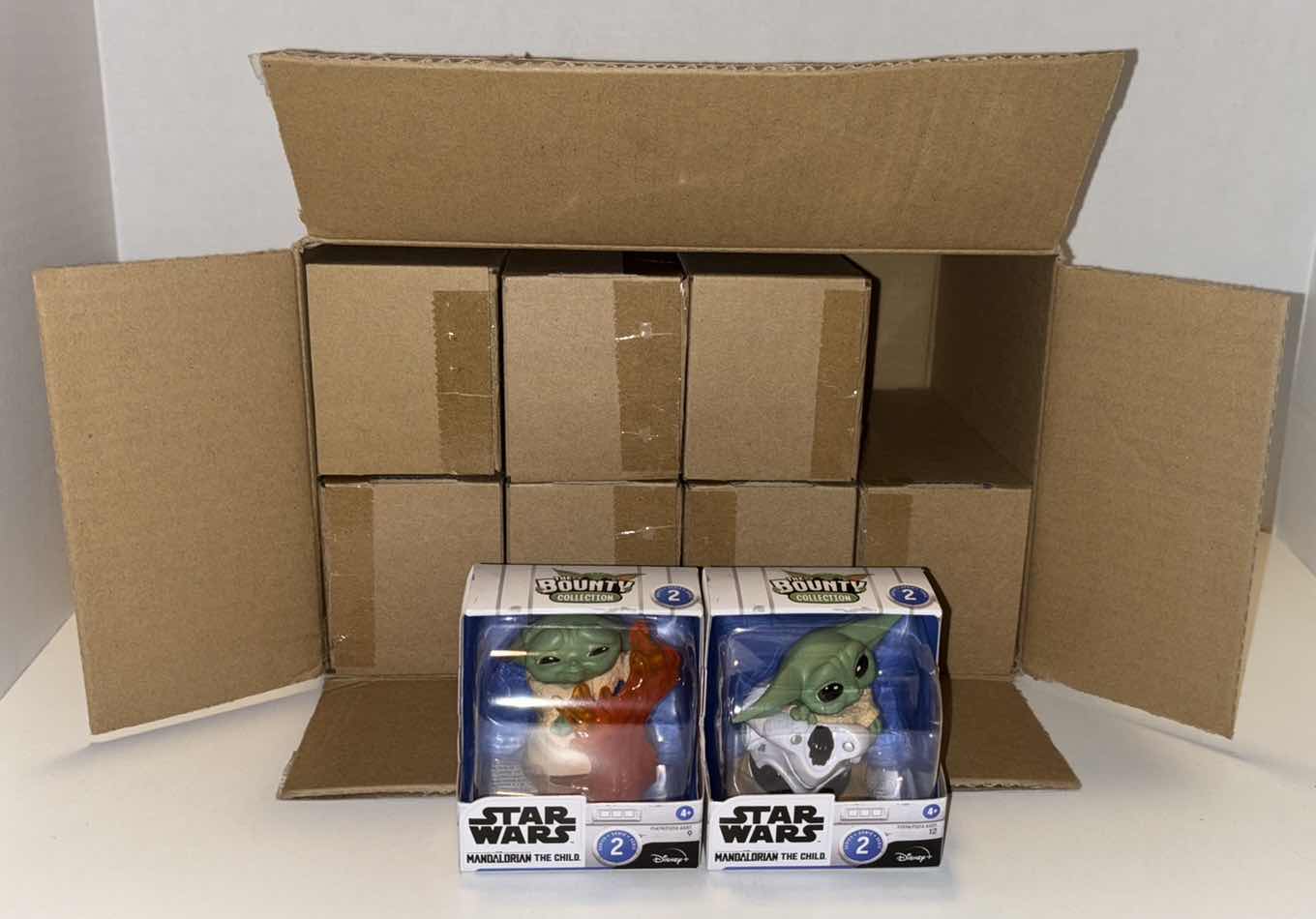 Photo 1 of NEW STAR WARS THE BOUNTY COLLECTION SERIES 3 THE CHILD POSED COLLECTIBLE 2-PACK FIGURES, “HIDING POSE” & “STOPPING FIRE” (CASE OF 8)