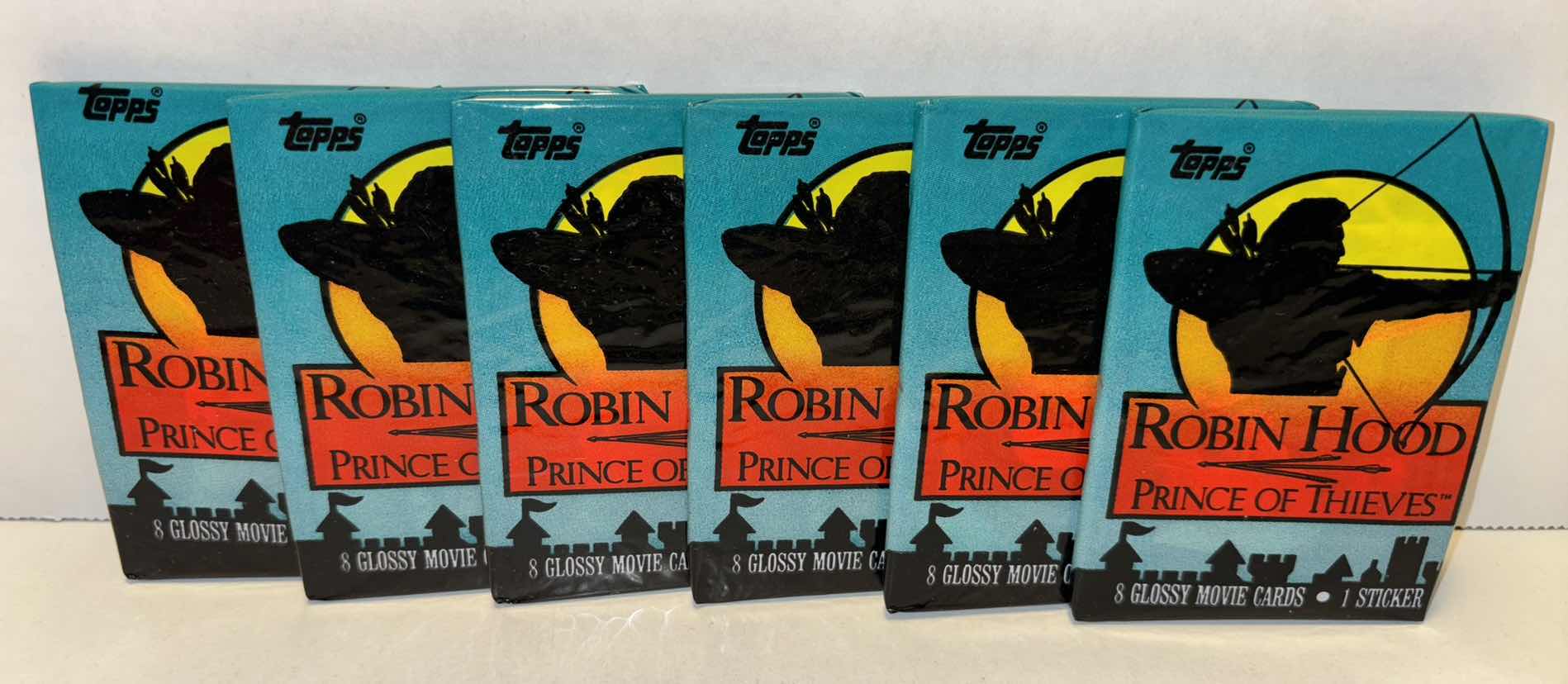 Photo 1 of NEW 6-PACK VINTAGE TOPPS 1991 COLLECTIBLE TRADING CARDS, 8 CT GLOSSY MOVIE CARDS W STICKER, “ROBIN HOOD: PRINCE OF THIEVES”