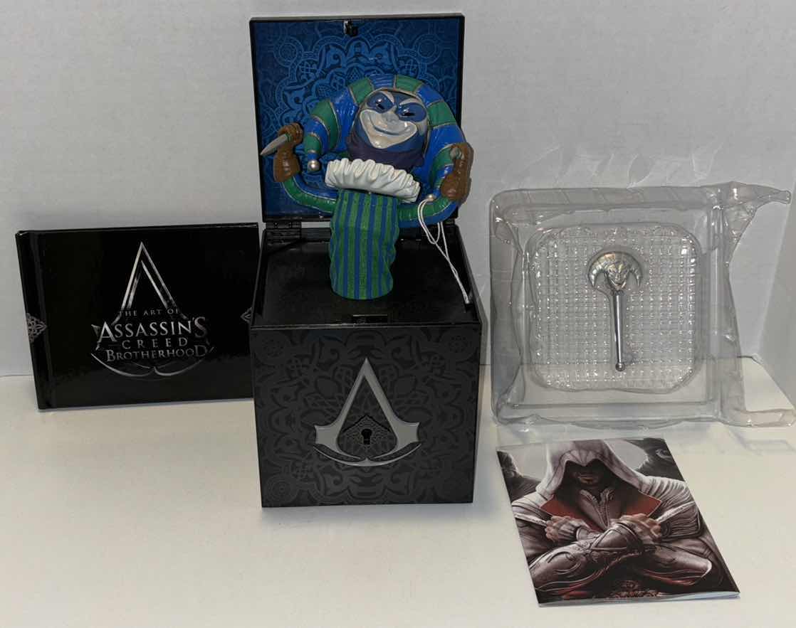 Photo 1 of UBISOFT XBOX 360 COLLECTORS EDITION ASSASSINS CREED BROTHERHOOD: INCLUDES COLLECTOR’S TIN, HARLEQUIN JACK-IN-THE-BOX COLLECTIBLE, EXCLUSIVE ART BOOK, HARD COPY STRATEGY MAP OF ROME