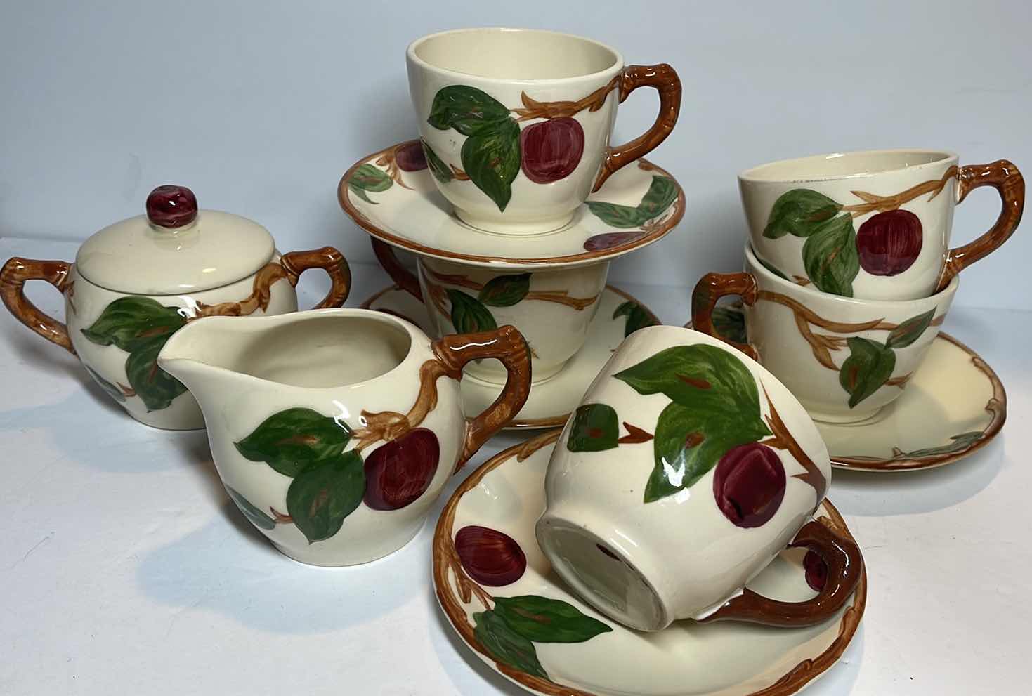 Photo 2 of VINTAGE FRANCISCAN EARTHWARE APPLE COLLECTION - 
TEA CUPS AND SUCERS W/ CREAM AND SUGAR - MORE OF THIS COLLECTION IN AUCTION