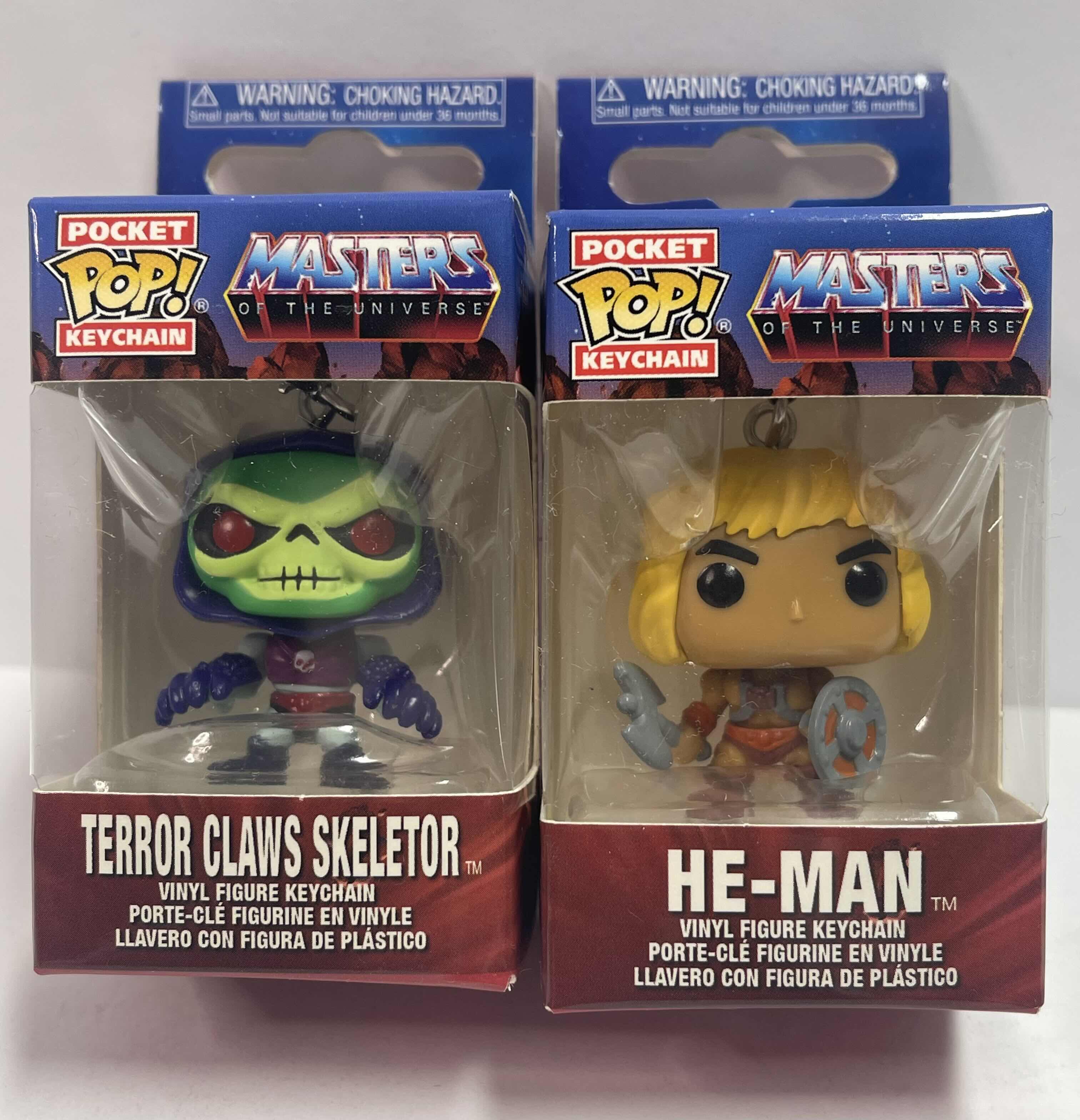 Photo 1 of NEW 3 POCKET POP KEYCHAINS “MASTERS OF THE UNIVERSE “ - HE-MAN & TERROR CLAWS SKELETOR  - TOTAL RETAIL PRICE $ 22.00