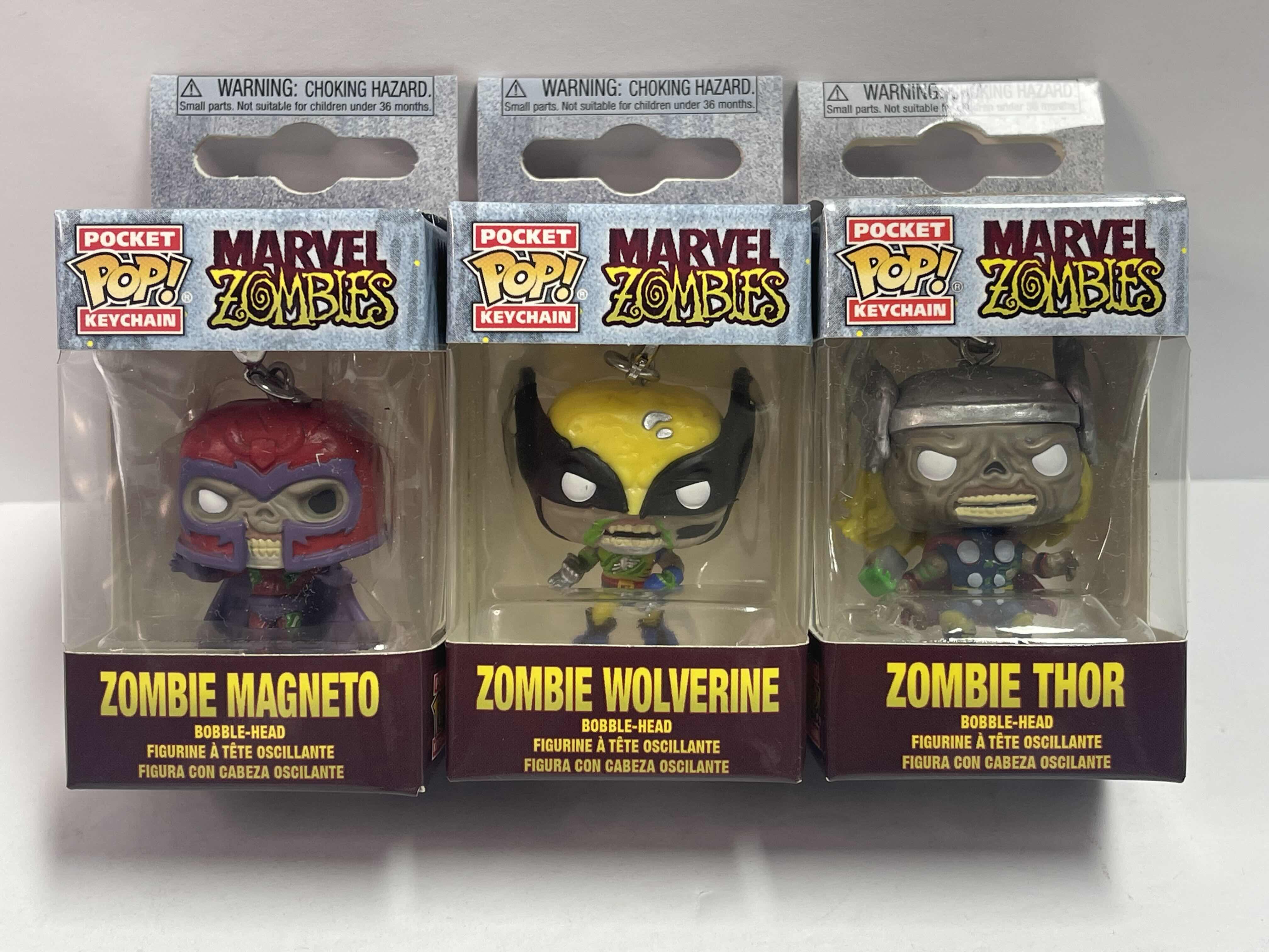 Photo 1 of NEW 3 POCKET POP KEYCHAINS “MARVEL ZOMBIES “ - ZOMBIE WOLVERINE , THOR & MAGNETO  - TOTAL RETAIL PRICE $ 32.00