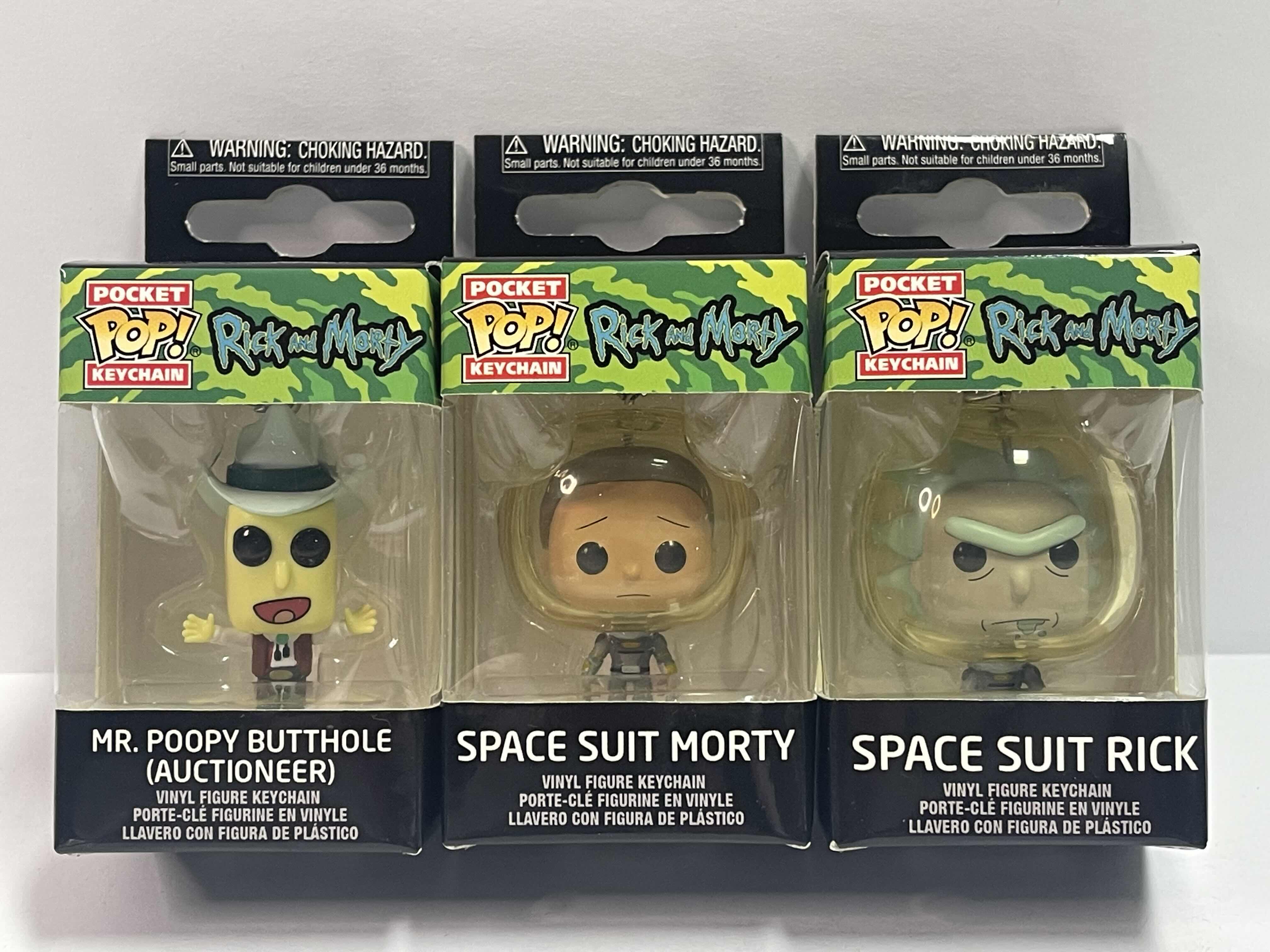 Photo 1 of NEW 3 POCKET POP KEYCHAINS “RICK AND MORTY  “ - MR POOPY BUTTHOLE, SPACESUIT MORTY & SPACESUIT RICK  - TOTAL RETAIL PRICE $ 32.00