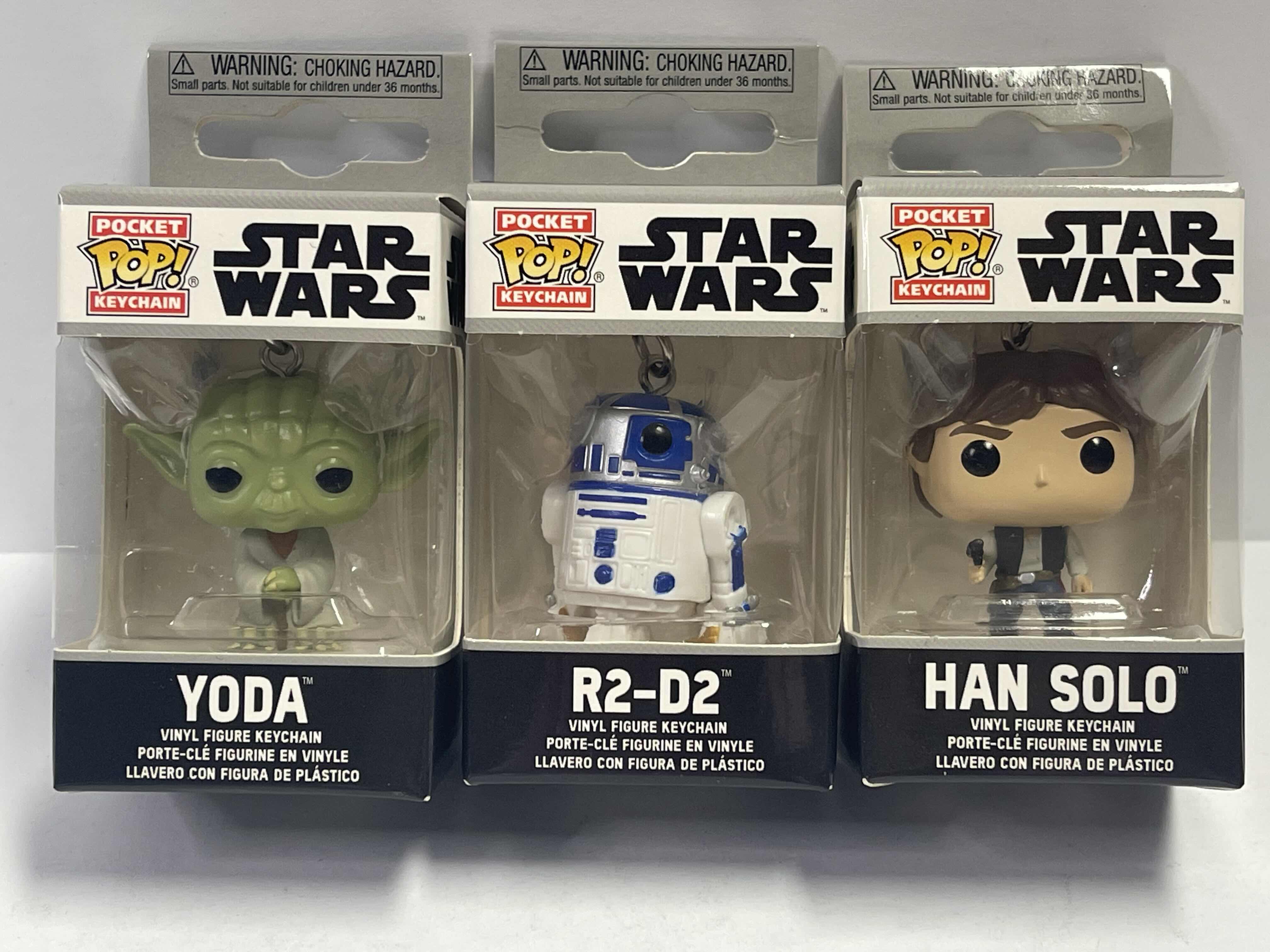 Photo 1 of NEW 3 POCKET POP KEYCHAINS “STAR WARS “ - HAN SOLO , R2-D2 & YODA - TOTAL RETAIL PRICE $ 32.00