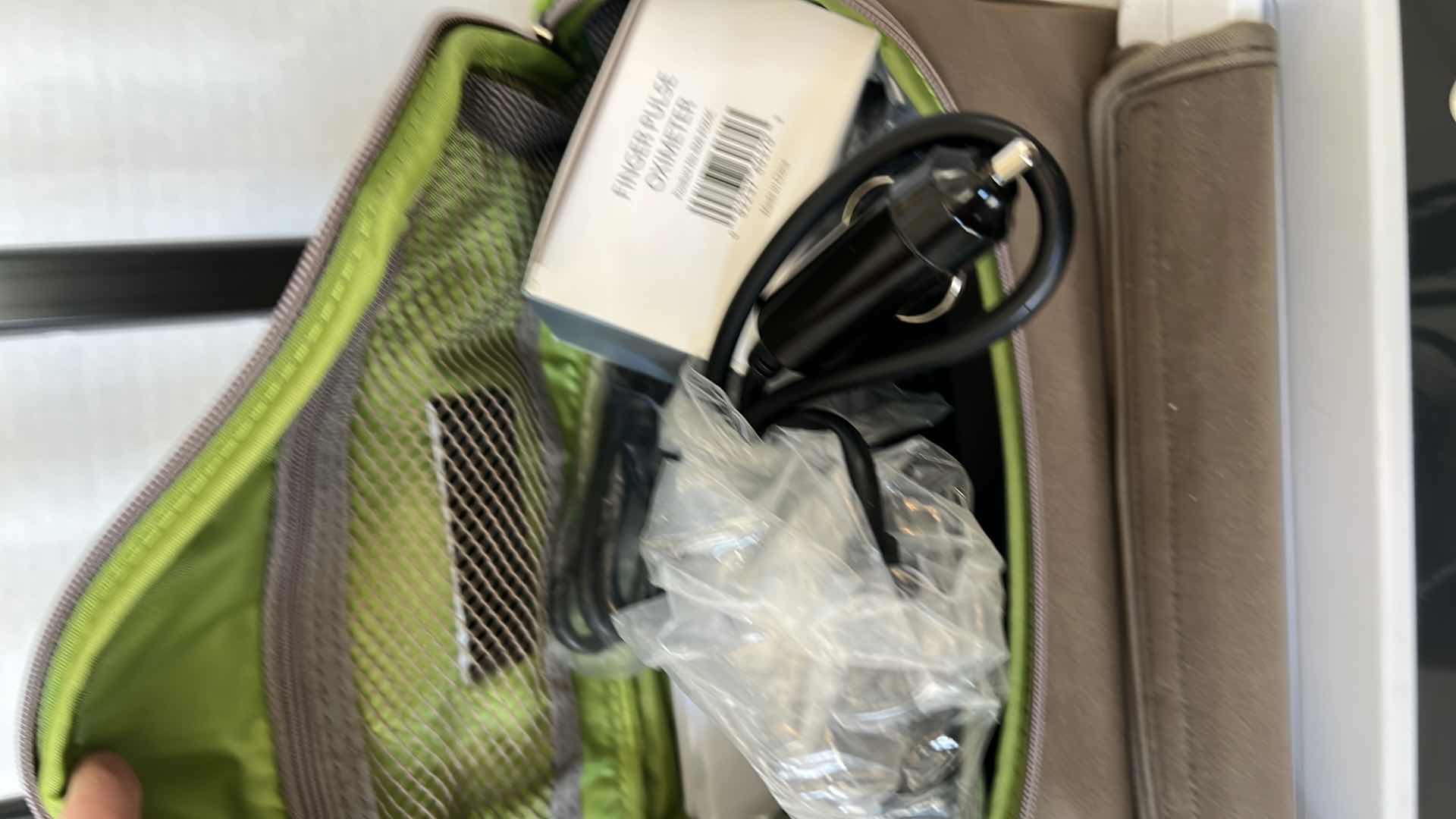 Photo 4 of PHILLIPS RESPIRONICS “SIMPLY GO” PORTABLE OXYGEN CONCENTRATOR. COMES WITH ROLLING TRAVELING BAG. EXTRA BATTERY, ACCESSORIES, AND BRAND NEW HOSES.  BARELY USED.  LIKE NEW MEDICAL EQUIPMENT.