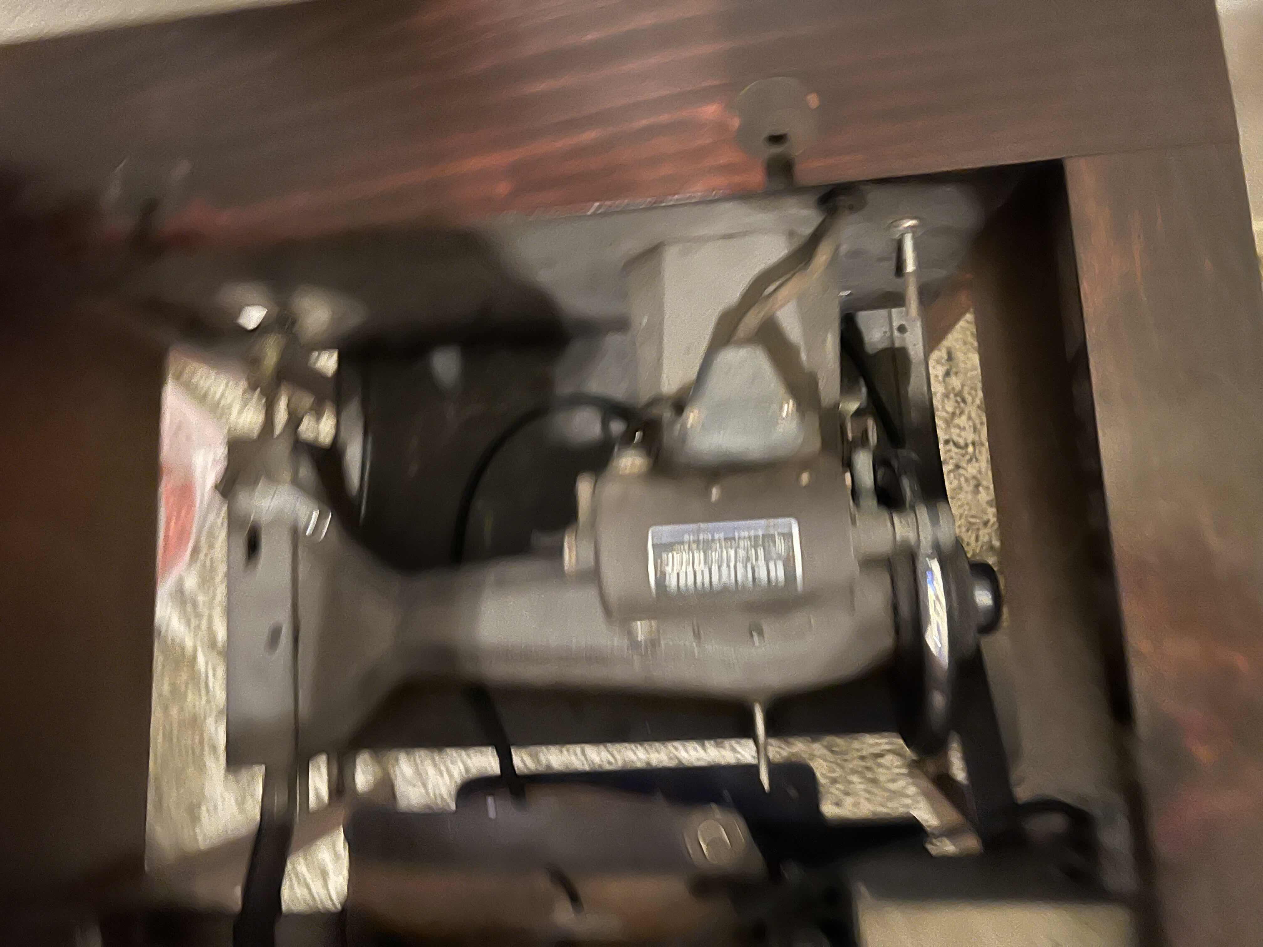 Photo 2 of ANTIQUE 1950’S ROTARY KENMORE SEWING MACHINE. IN WOODEN TABLE WITH TOOLS AND ACCESSORIES. $325