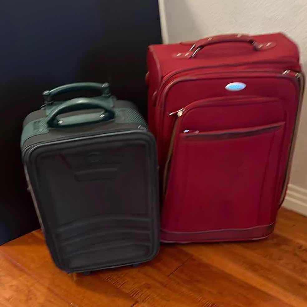 Photo 1 of 2-ROLLER SUITCASES BY SAMSONITE AND MICARY. ONE CARRYON SIZE, ONE SLIGHTLY LARGER.