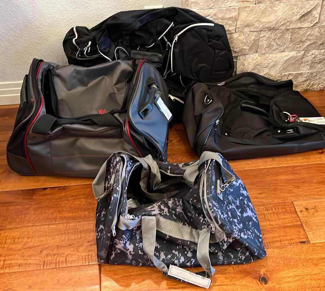 Photo 1 of 5-DUFFEL BAGS. VARIOUS STYLES ANS COLORS. ONE ROLLING BAG.