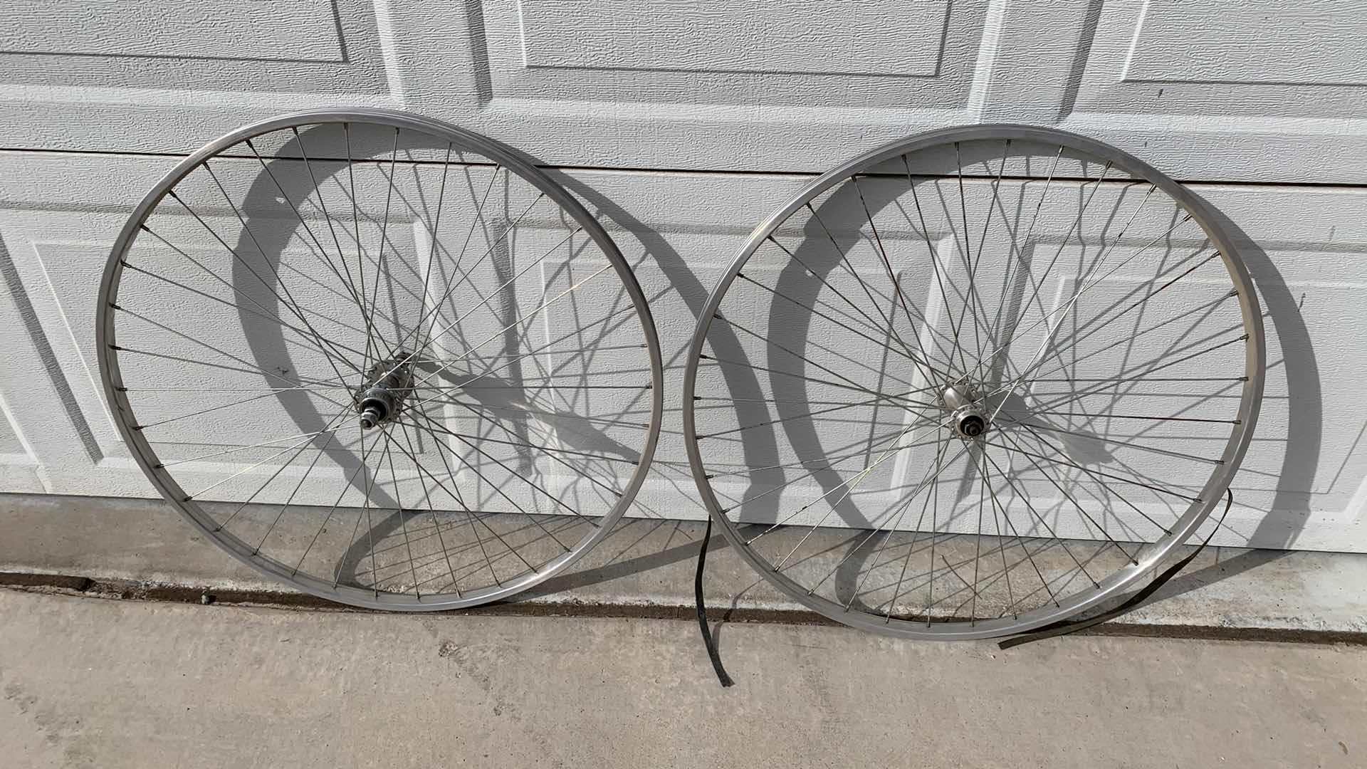 Photo 1 of 2-24” ALUMINUM BICYCLE RIMS