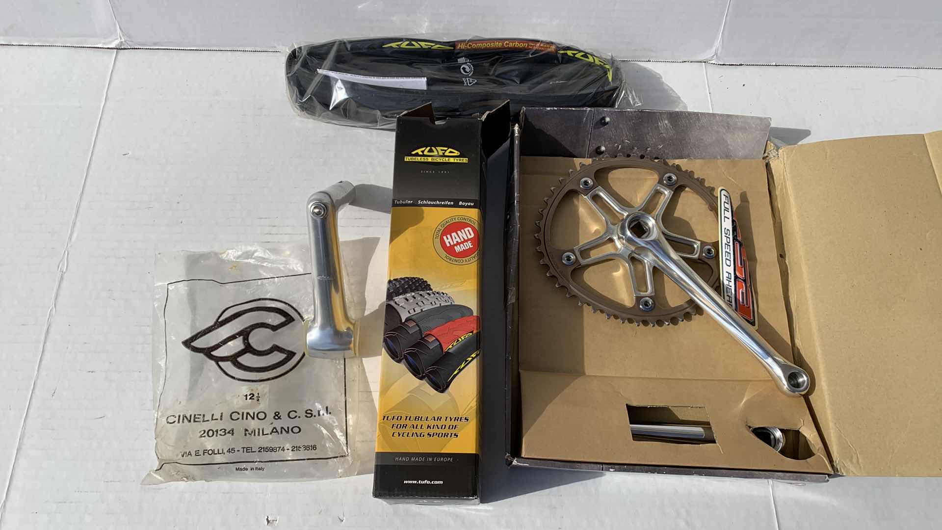 Photo 1 of NEW IN BOX- CINELO BICYCLE SPROCKET 12.5", TUBLESS "TUFO" TIRE, AND A NECK. MODEL 20134, BIKE PARTS.