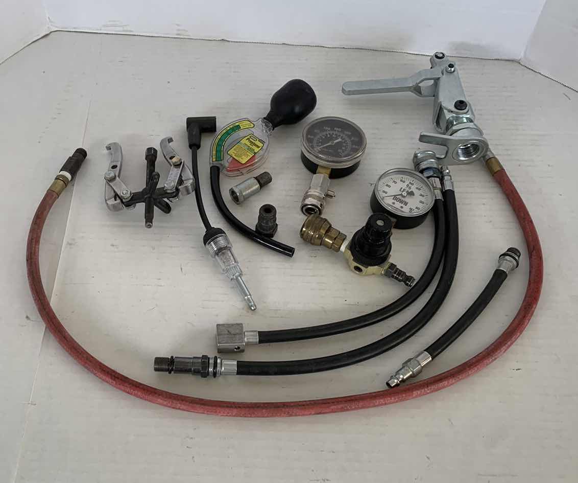 Photo 1 of AUTOPARTS-ENGINE REPAIR TOOLS INCLUDING A PISTON COMPRESSION GAUGE