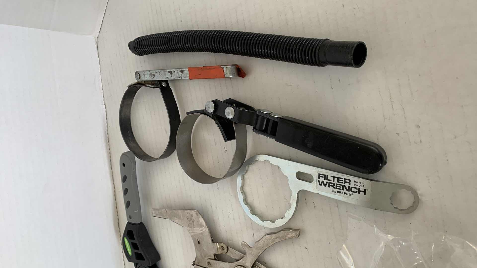 Photo 1 of AUTO PARTS.  OIL CHANGING TOOLS, FILTER WRENCHES, ETC.