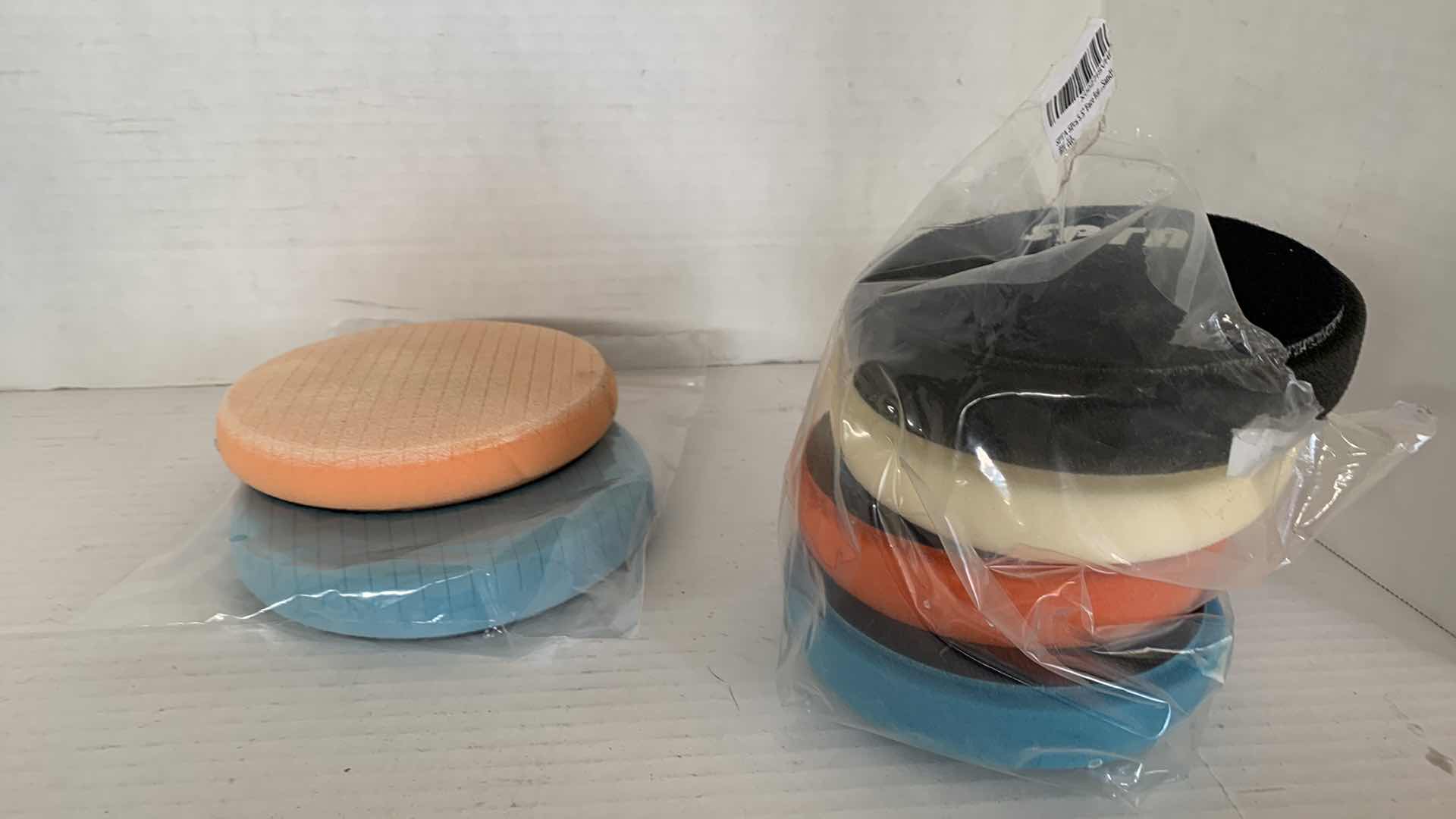 Photo 1 of CAR POLISHING PADS AND BRUSHES OF VARIOUS SIZES AND TEXTURES.