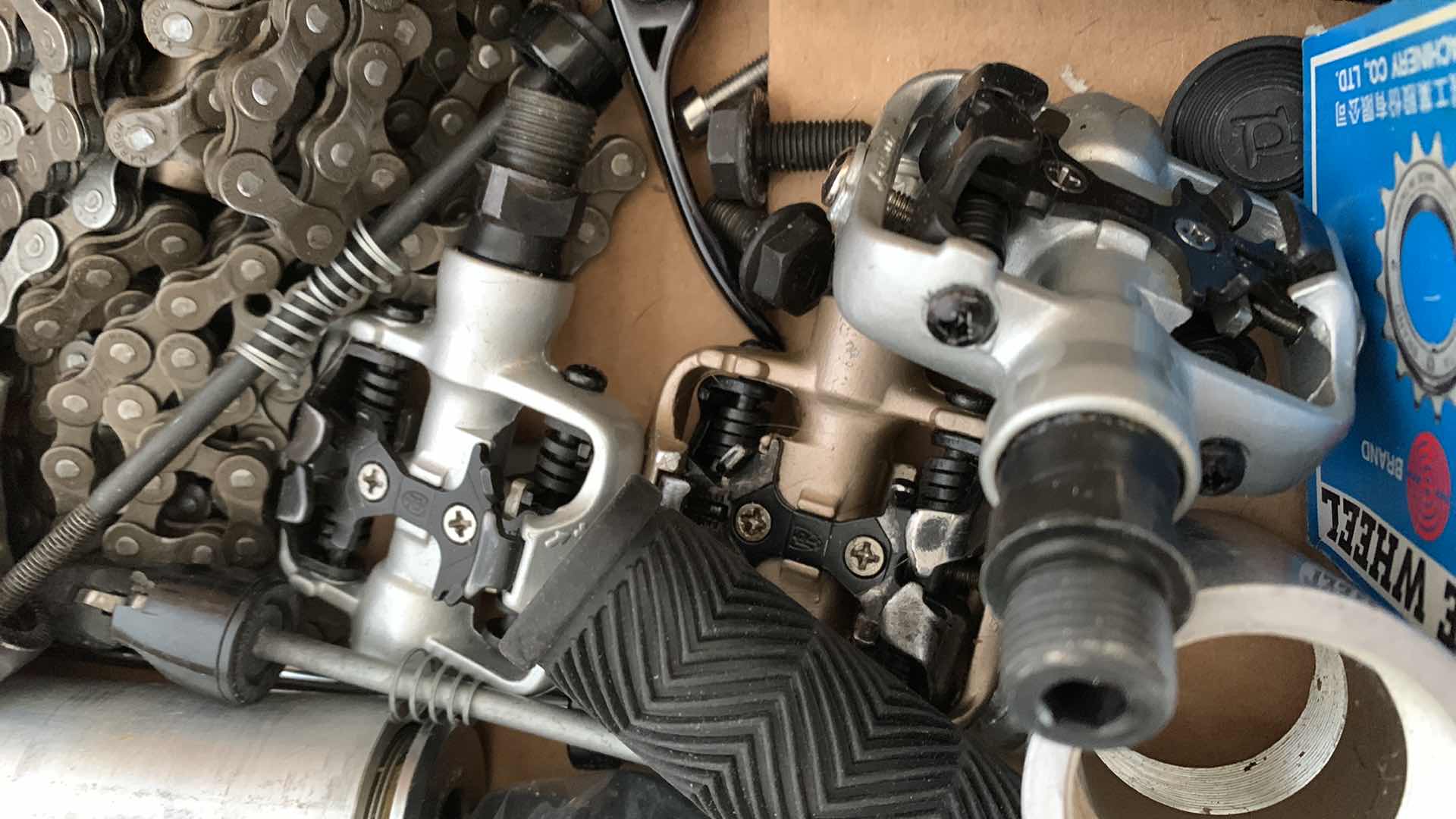 Photo 1 of BICYCLE CHAINS AND RACING CLIP IN FOOT PEDALS. ROAD BICYCLE ACCESSORIES.