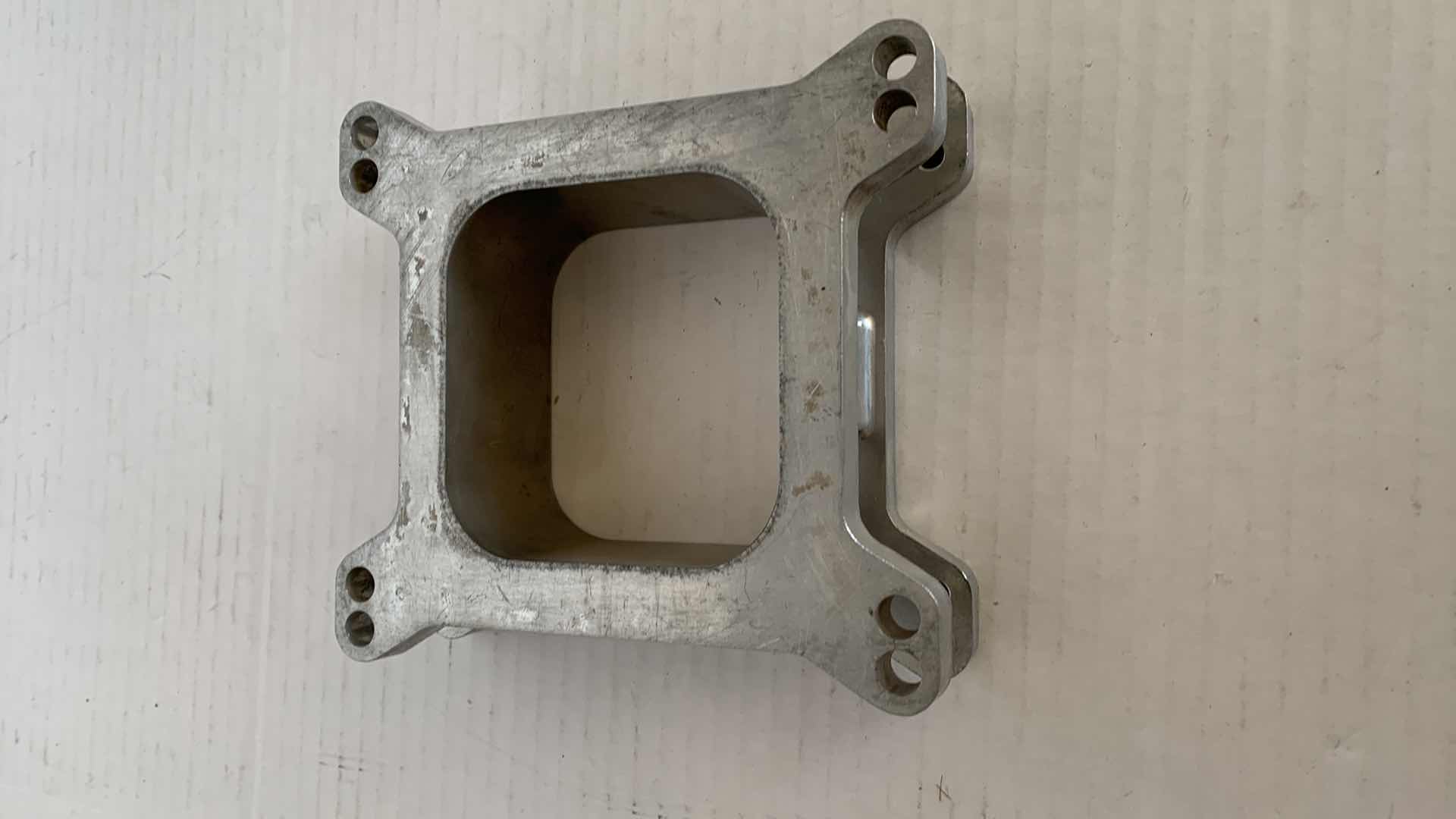 Photo 1 of AUTO PARTS-EDELBROCK 1 & 1/2” CARBURETOR SPACER CAT. NO. 8712