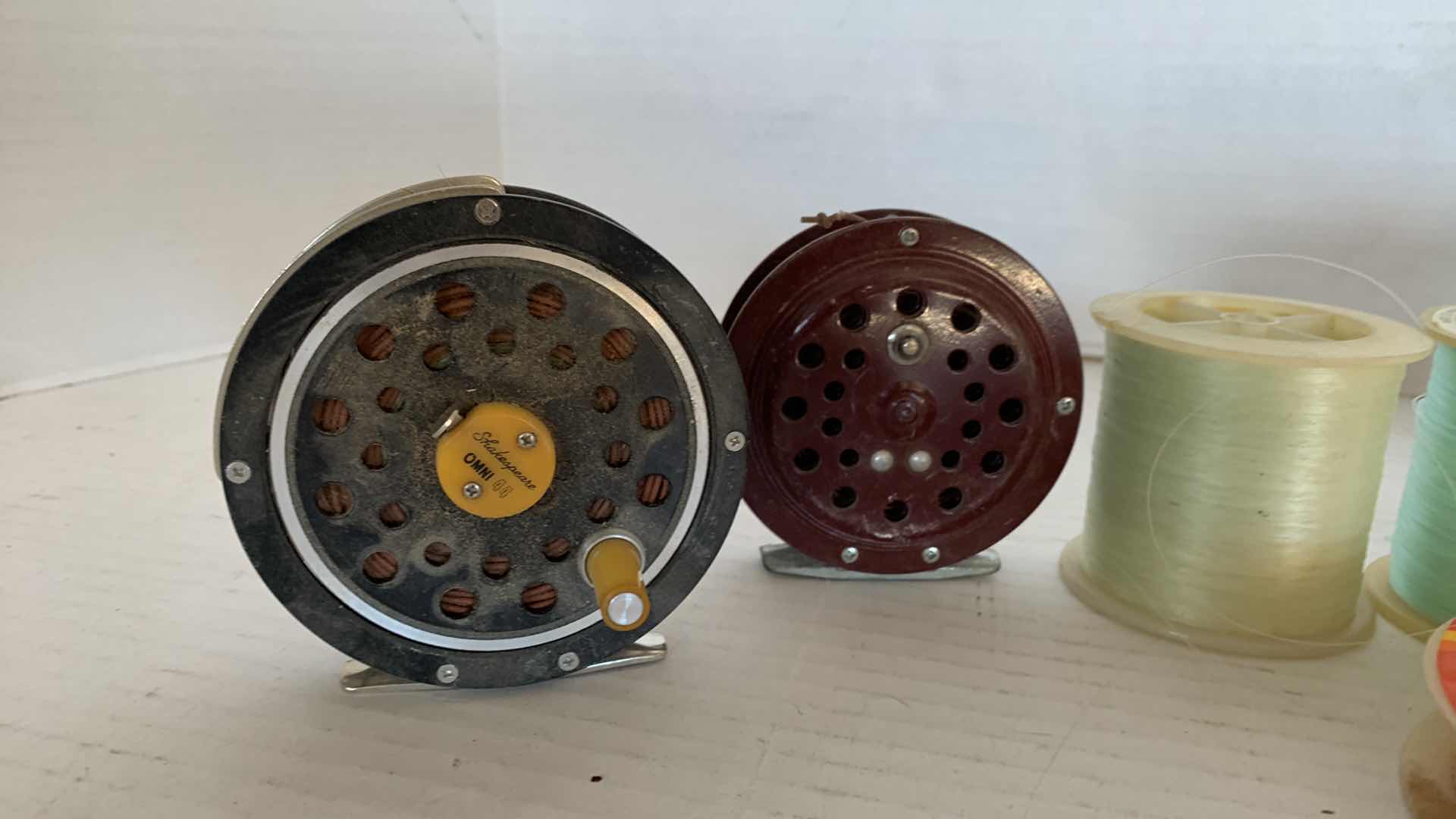 Photo 1 of 2-FLY FISHING REELS AND FISHING LINE