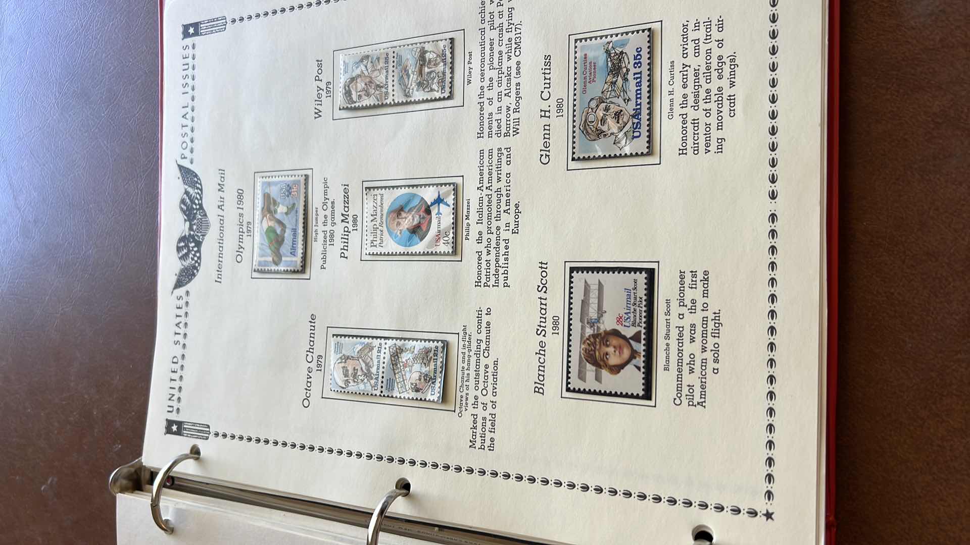 Photo 1 of US POSTAGE STAMP BINDER AND CONTENTS - NO RETURNS