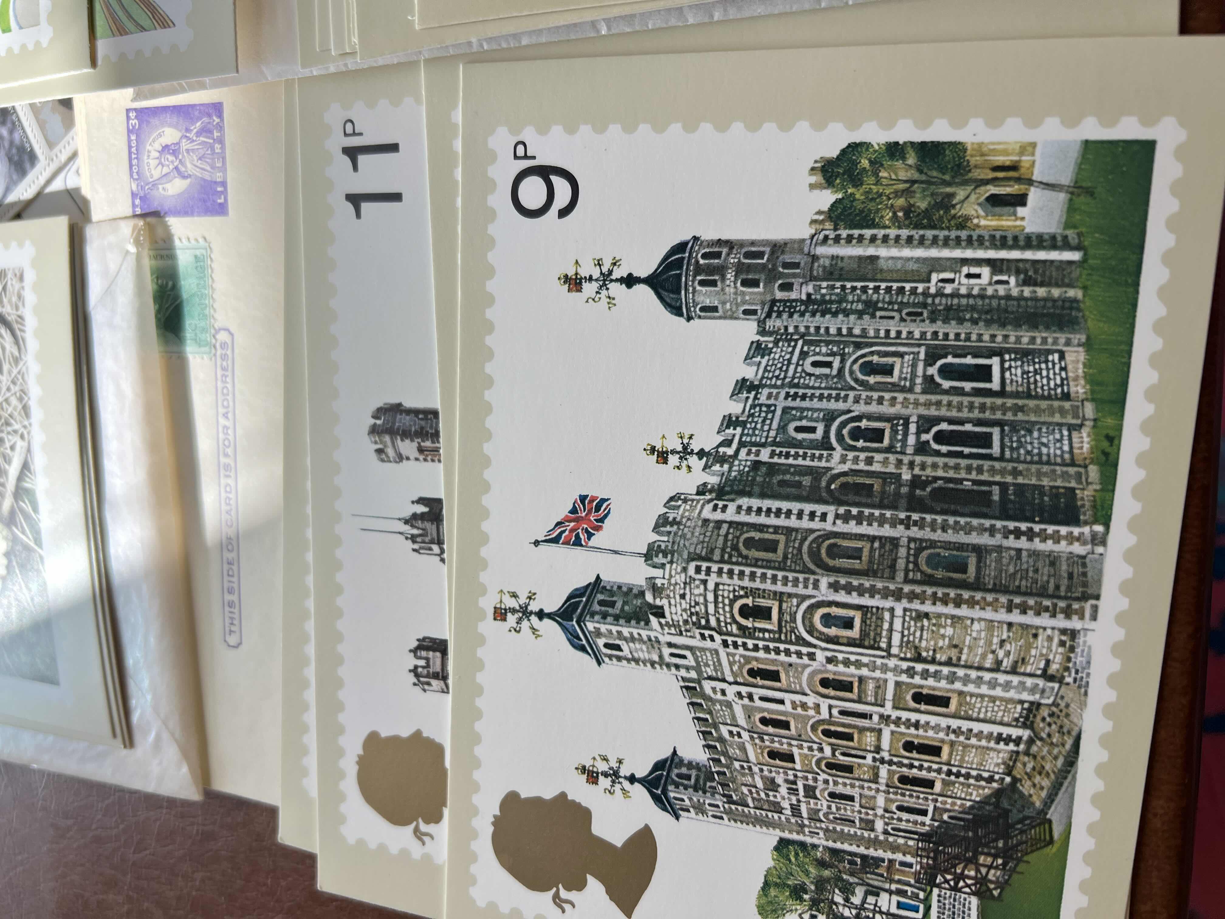 Photo 1 of LARGE LOT OF GREAT BRITAIN MINT POSTAGE CARDS AND FOREIGN FIRST DAY IF ISSUE STAMPED ENVELOPES AND MORE