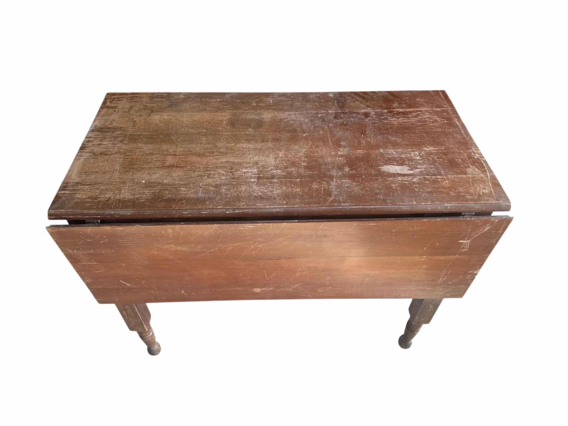 Photo 1 of VINTAGE DOUBLE DROP LEAF TABLE 39“ x 44“ H 29”