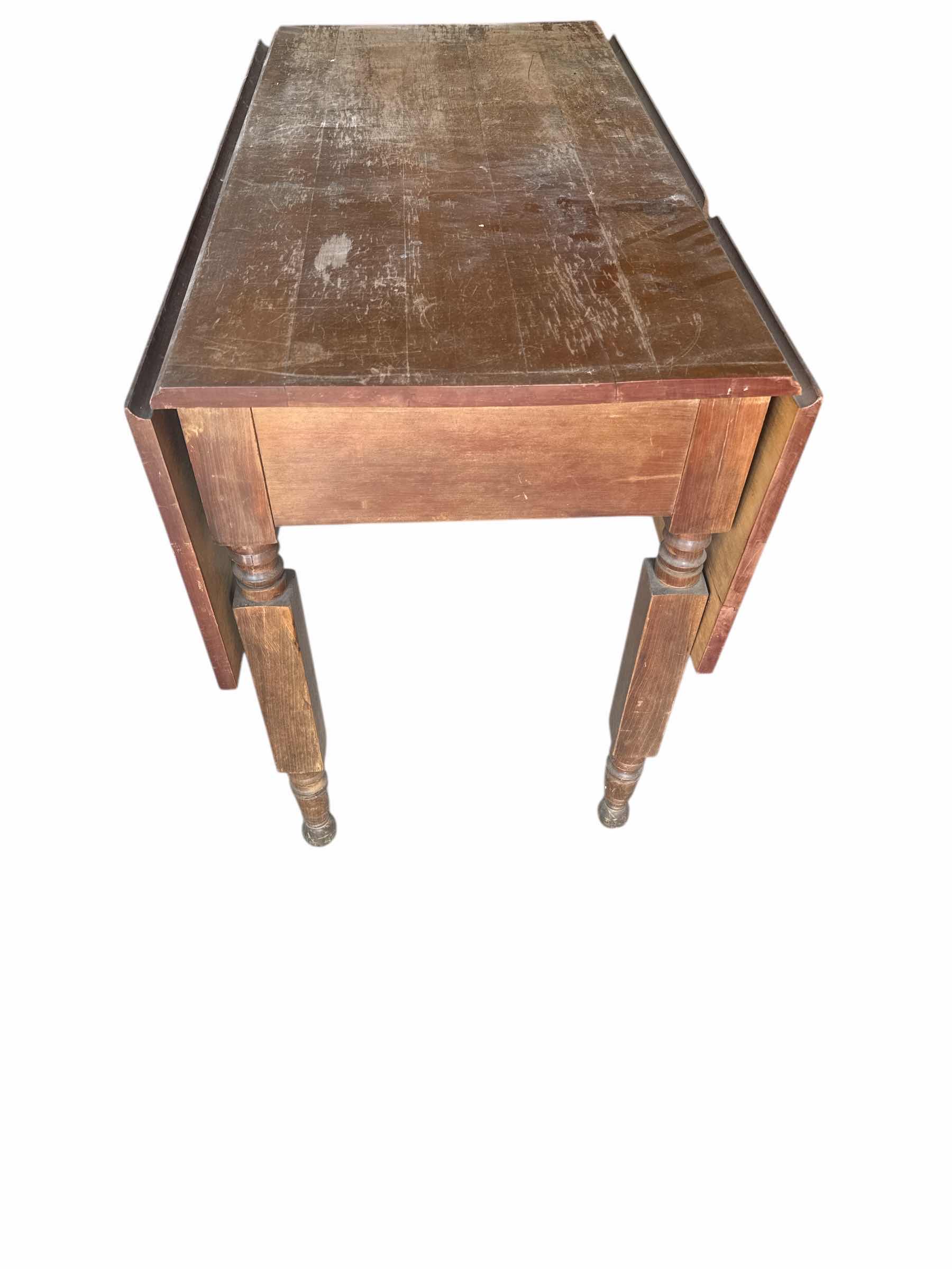 Photo 1 of VINTAGE DOUBLE DROP LEAF TABLE 39“ x 44“ H 29”