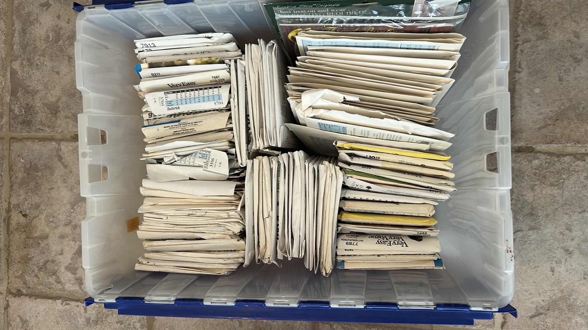 Photo 1 of CONTENTS OF TOTE ASSORTED SEWING PATERNS