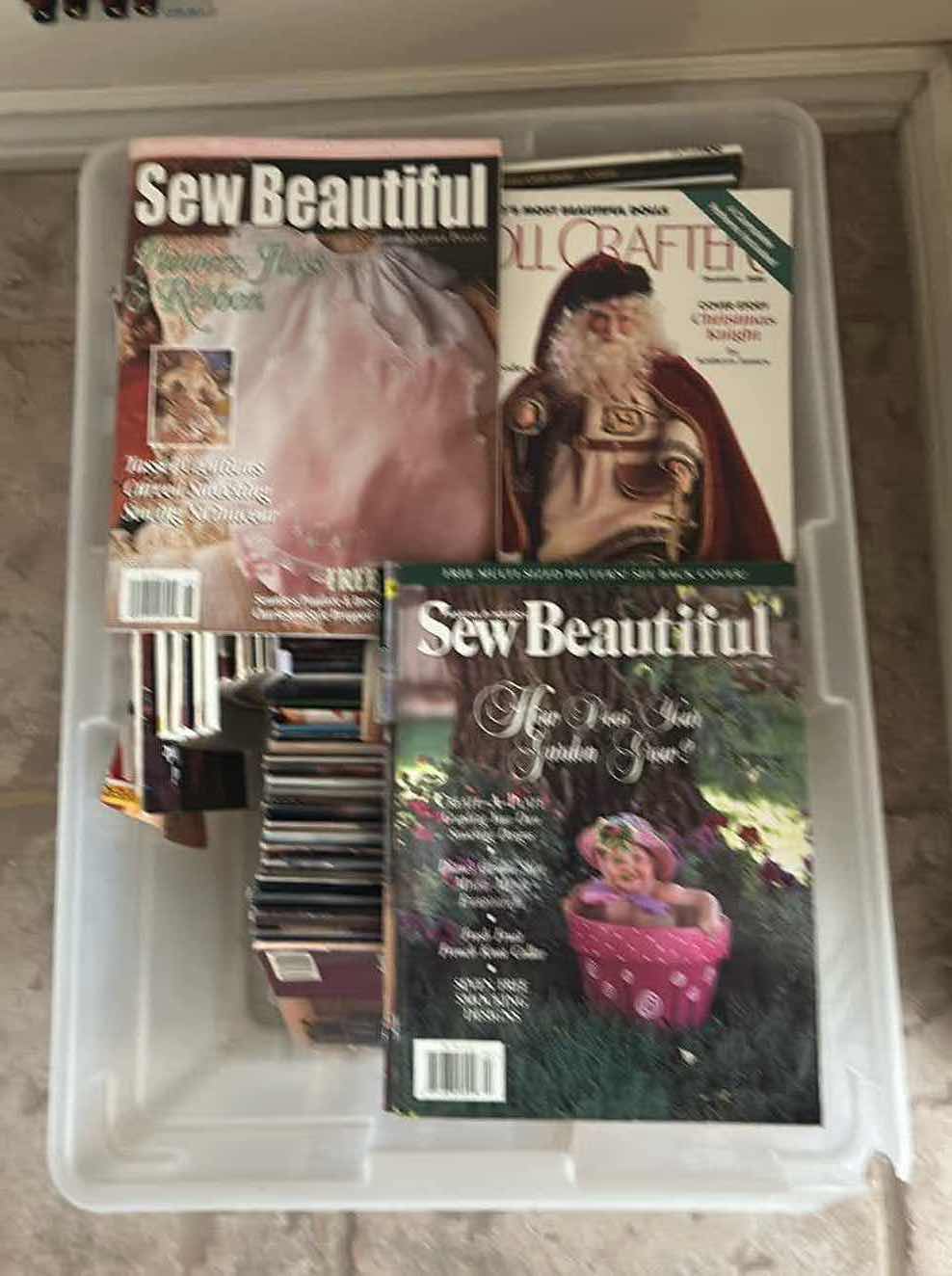 Photo 1 of CONTENTS OF TOTE ASSORTED SEWING MAGAZINES