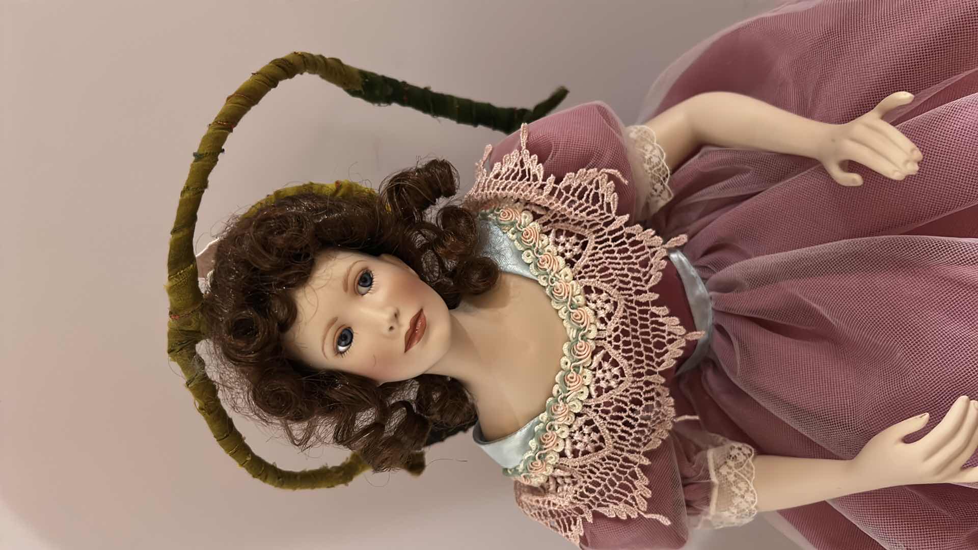 Photo 1 of PORCELAIN DOLL ON CHAIR