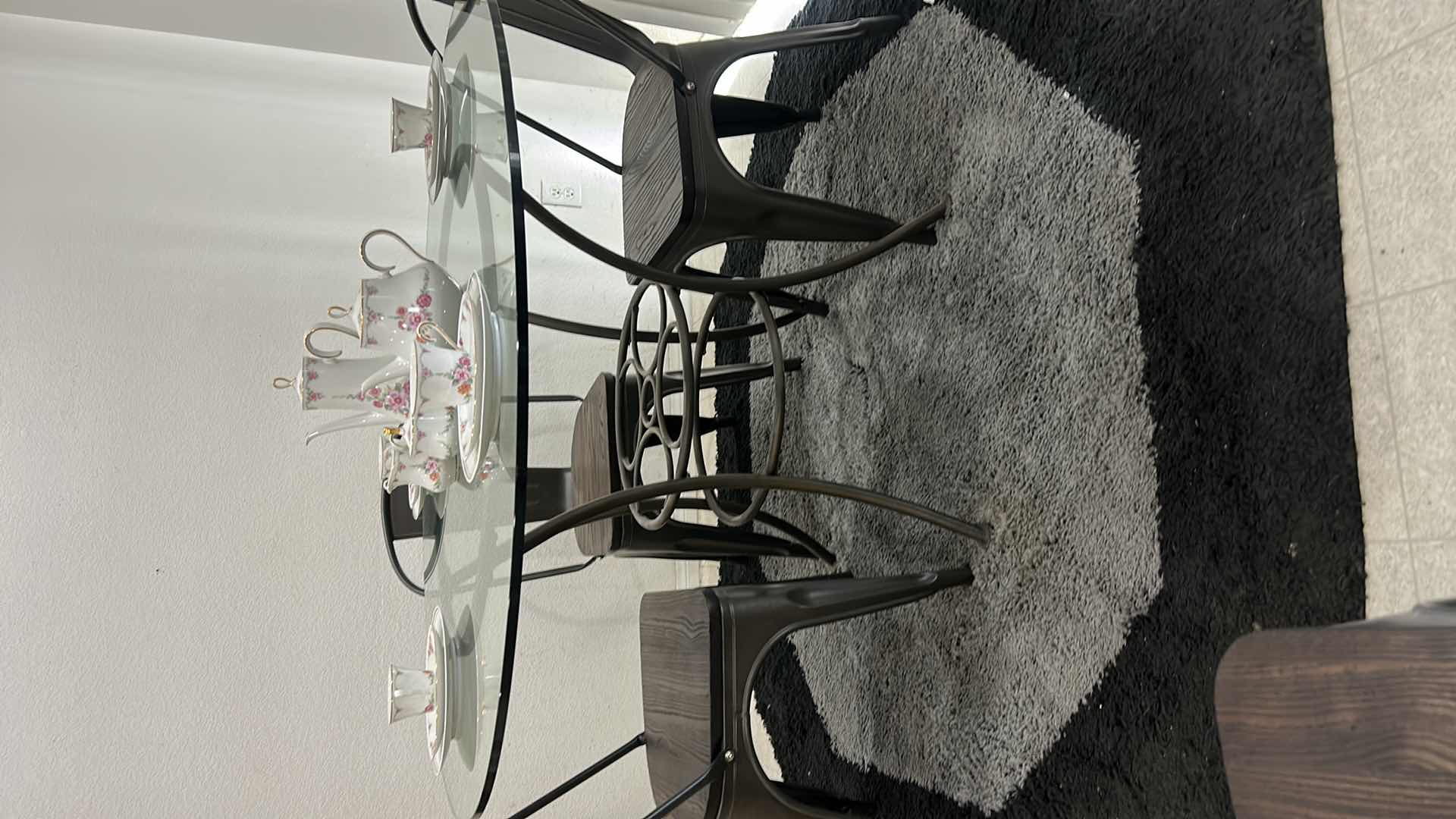 Photo 4 of METAL GLASS TOP 4’ ROUND TABLE WITH 4 METAL AND WOOD CHAIRS (CHINA SOLD SEPARATELY)